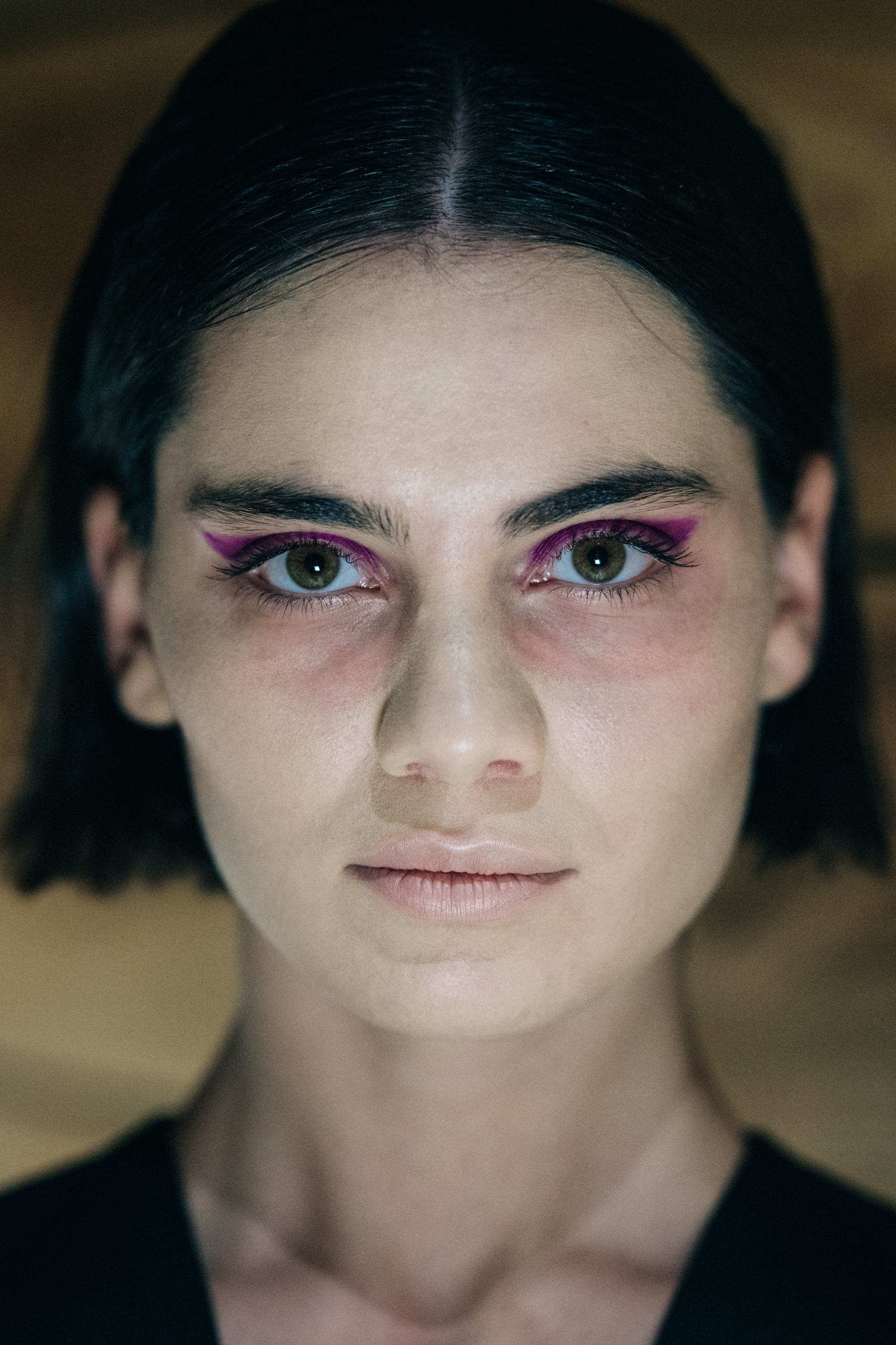 Portrait of Georgian model with purple eye makeup