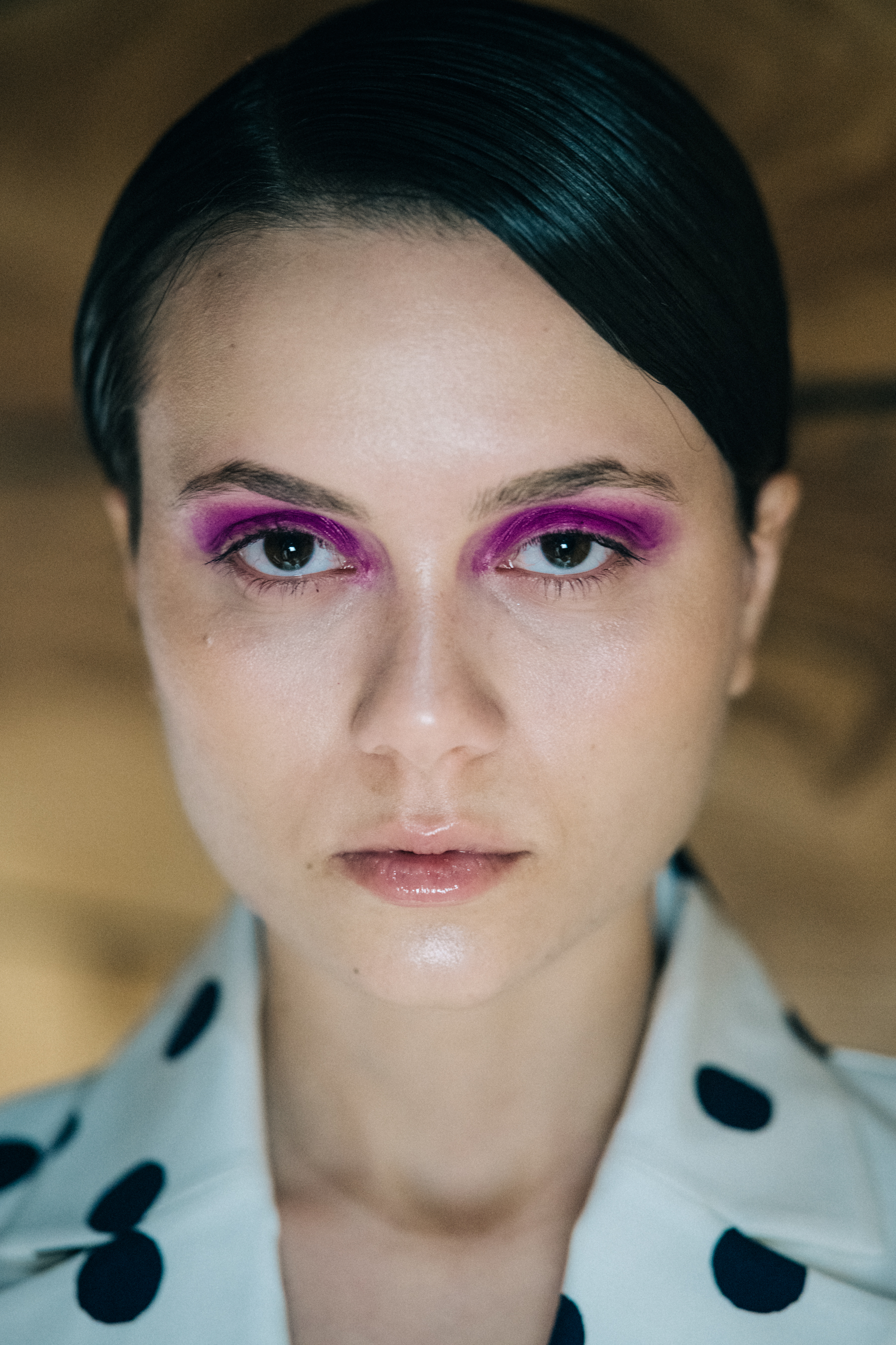 Portrait of Georgian model with purple eye makeup