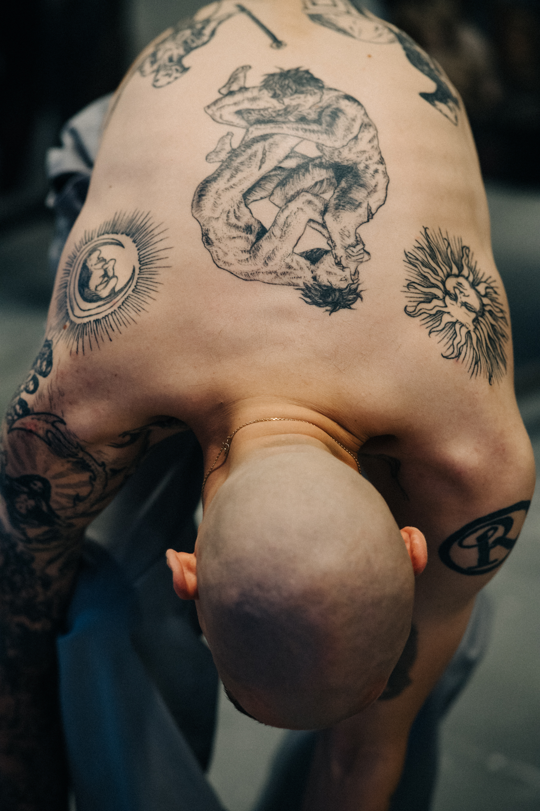 Male  model with tattoos before a show