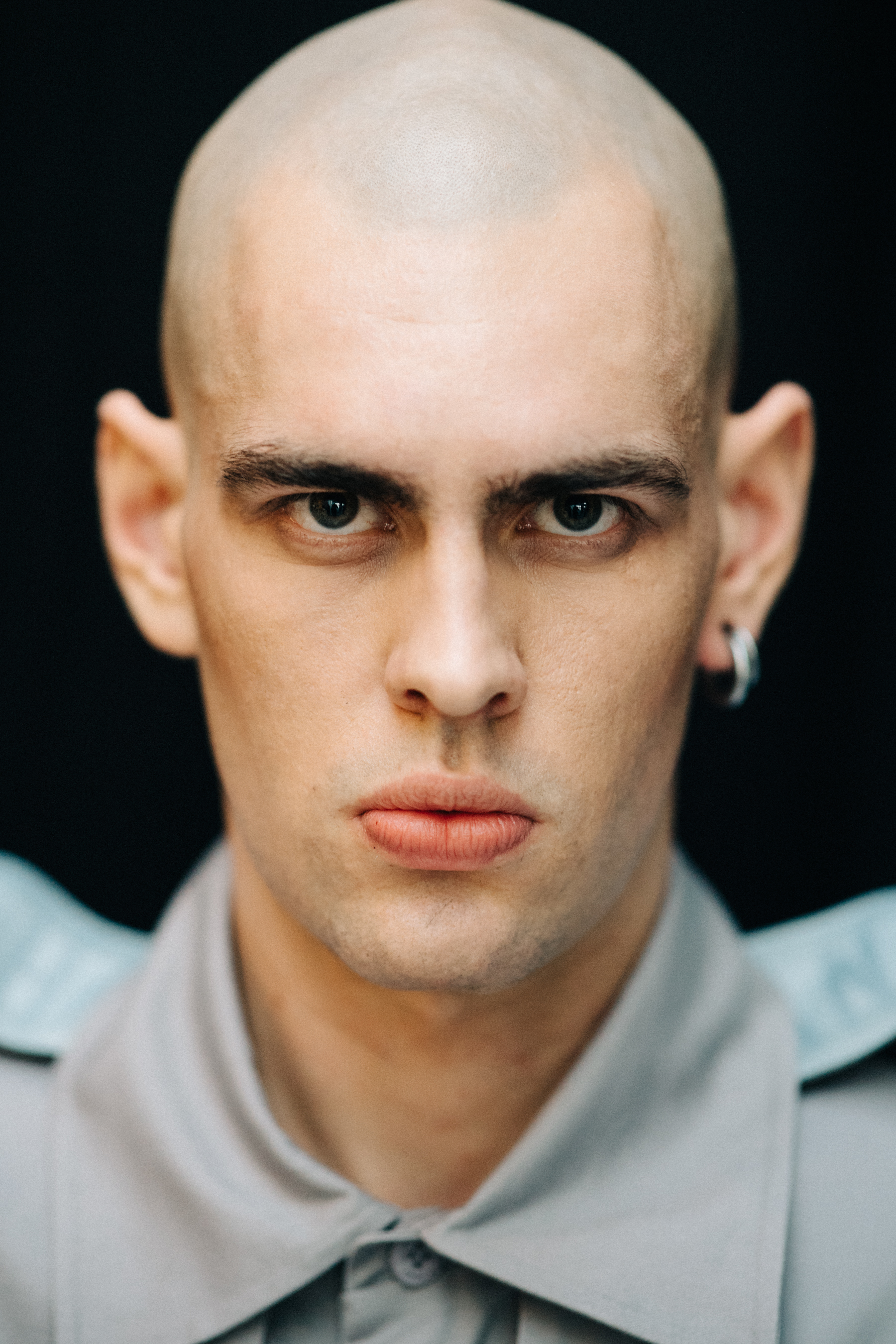 Portrait of a male model before a show