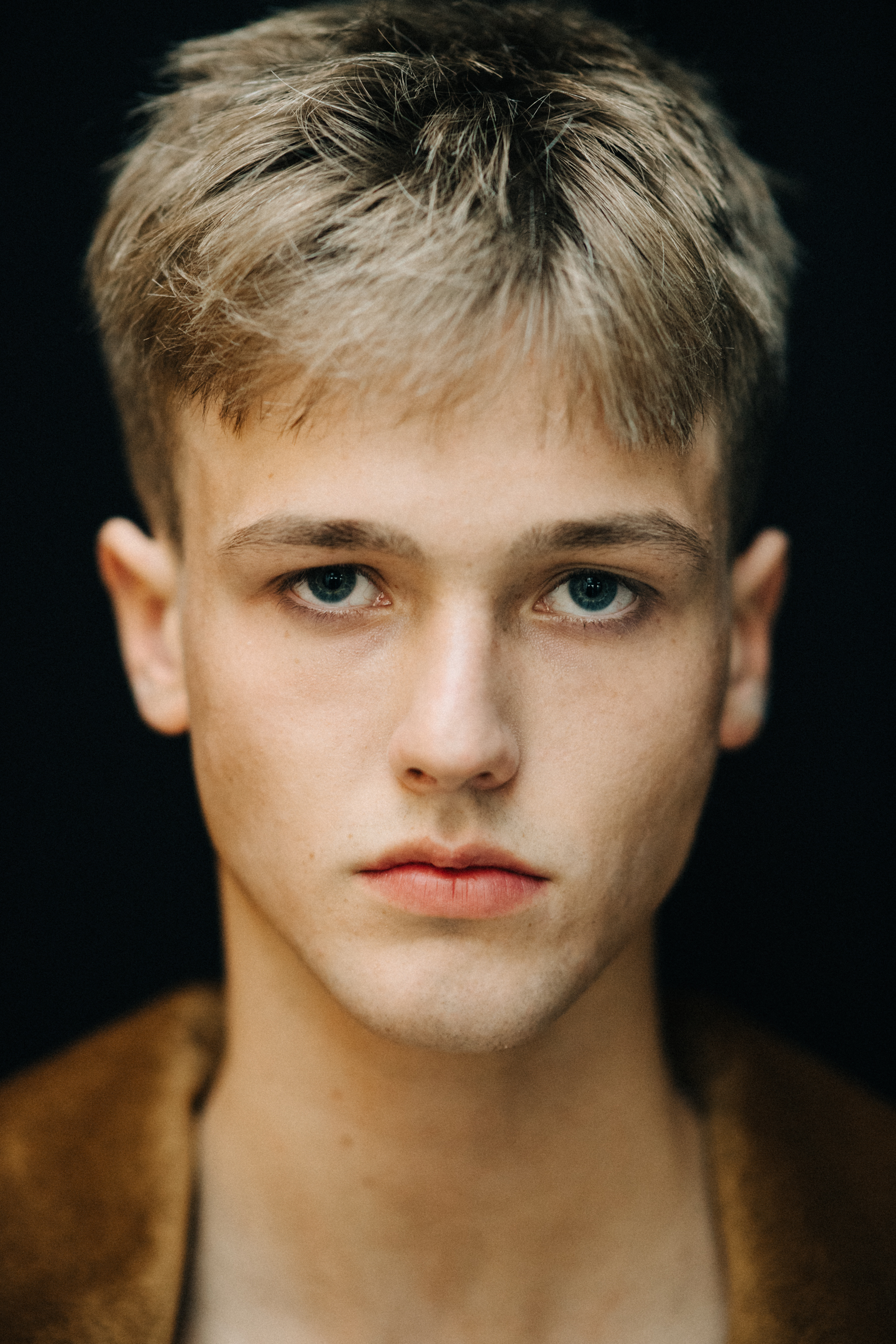 Portrait of a male model before a show