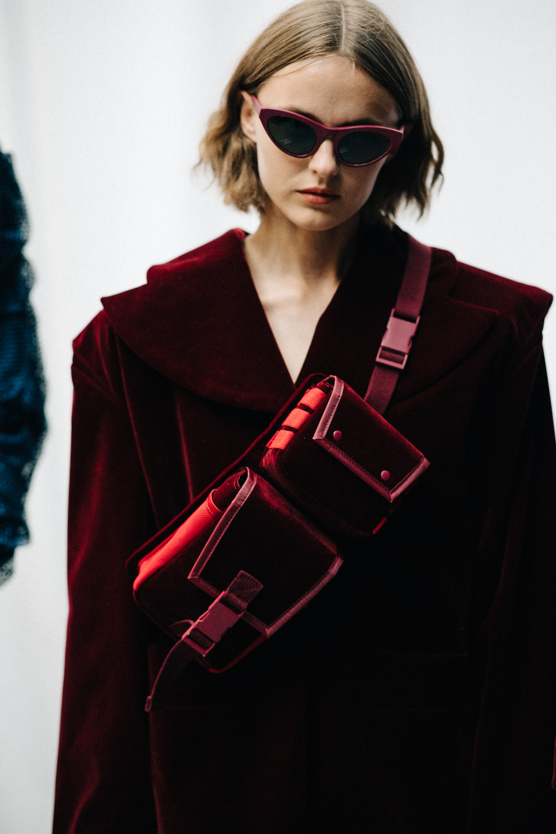 Model wearing red velvet outfit