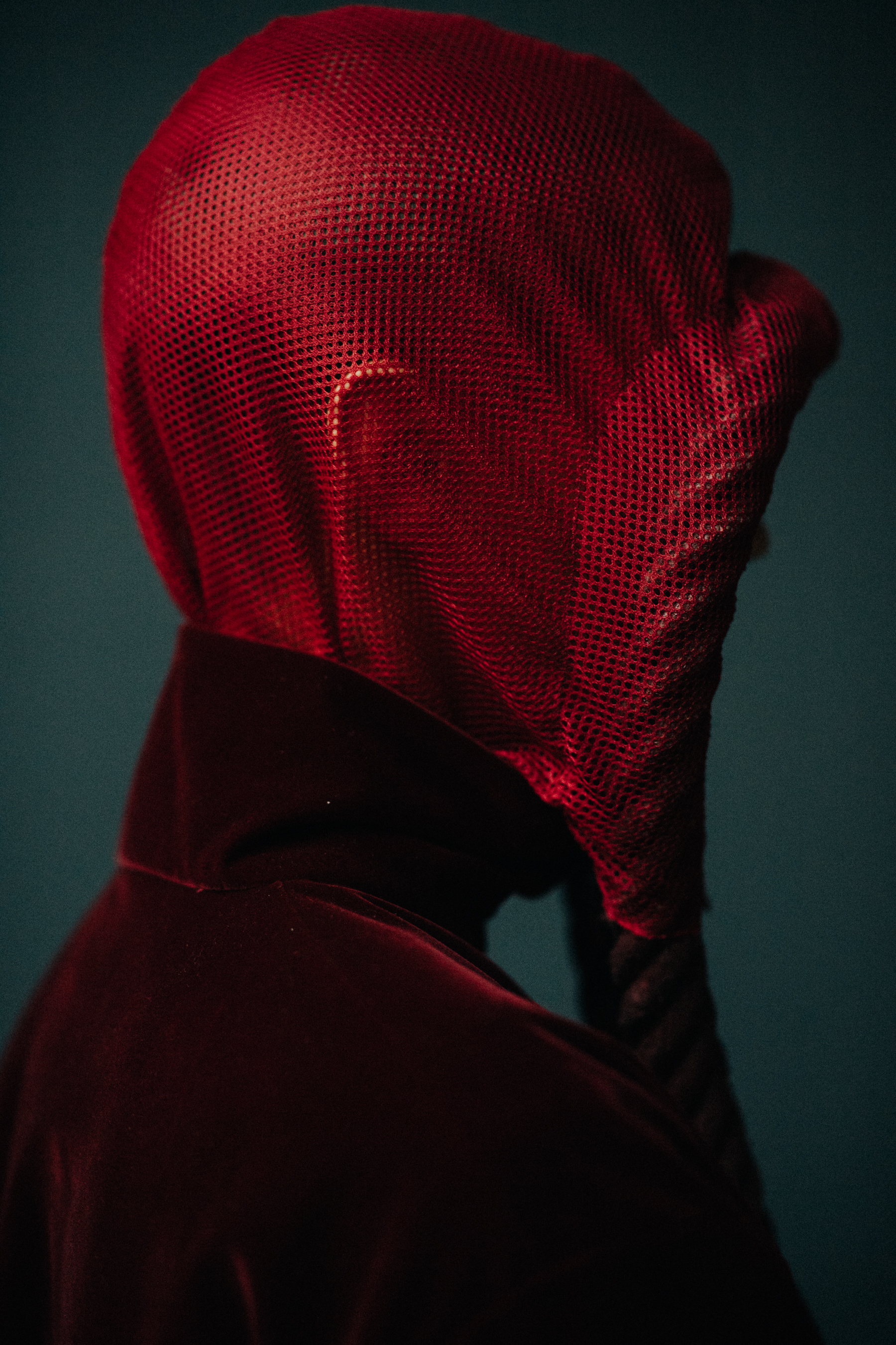Portrait of a male model wearing a hood