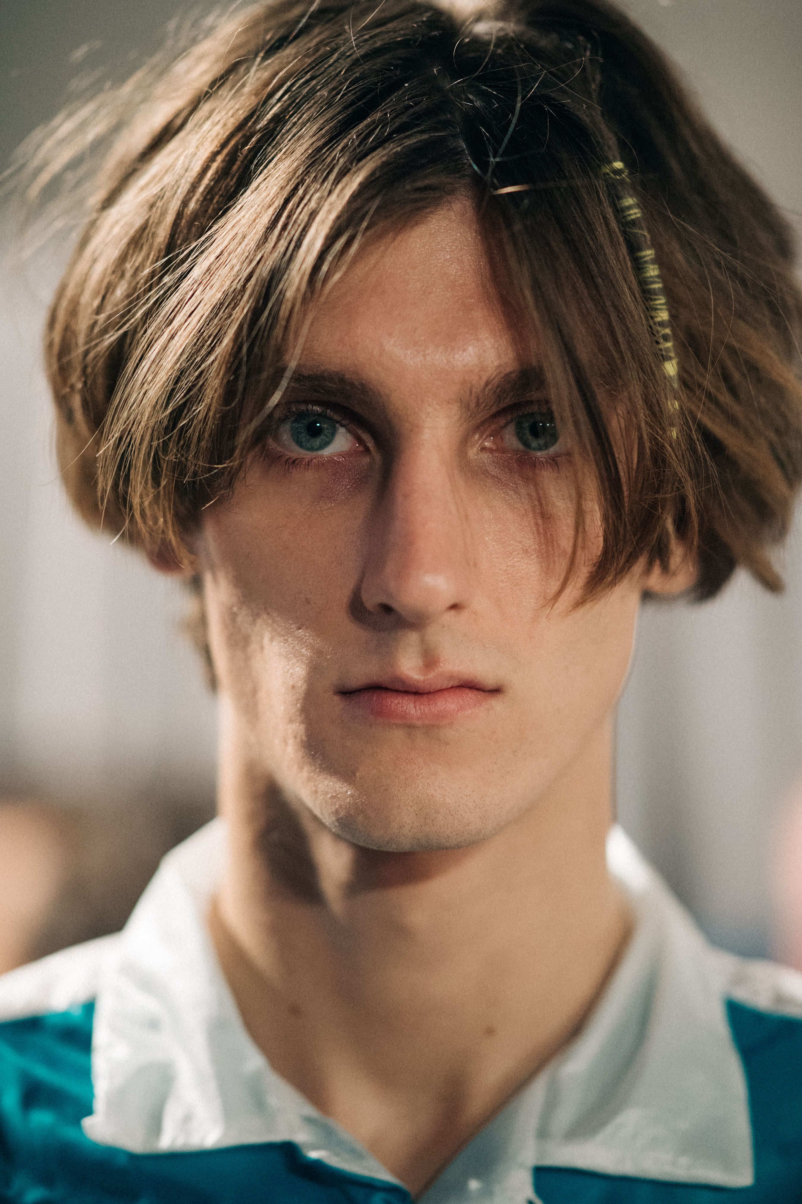 Portrait of a male model before a show