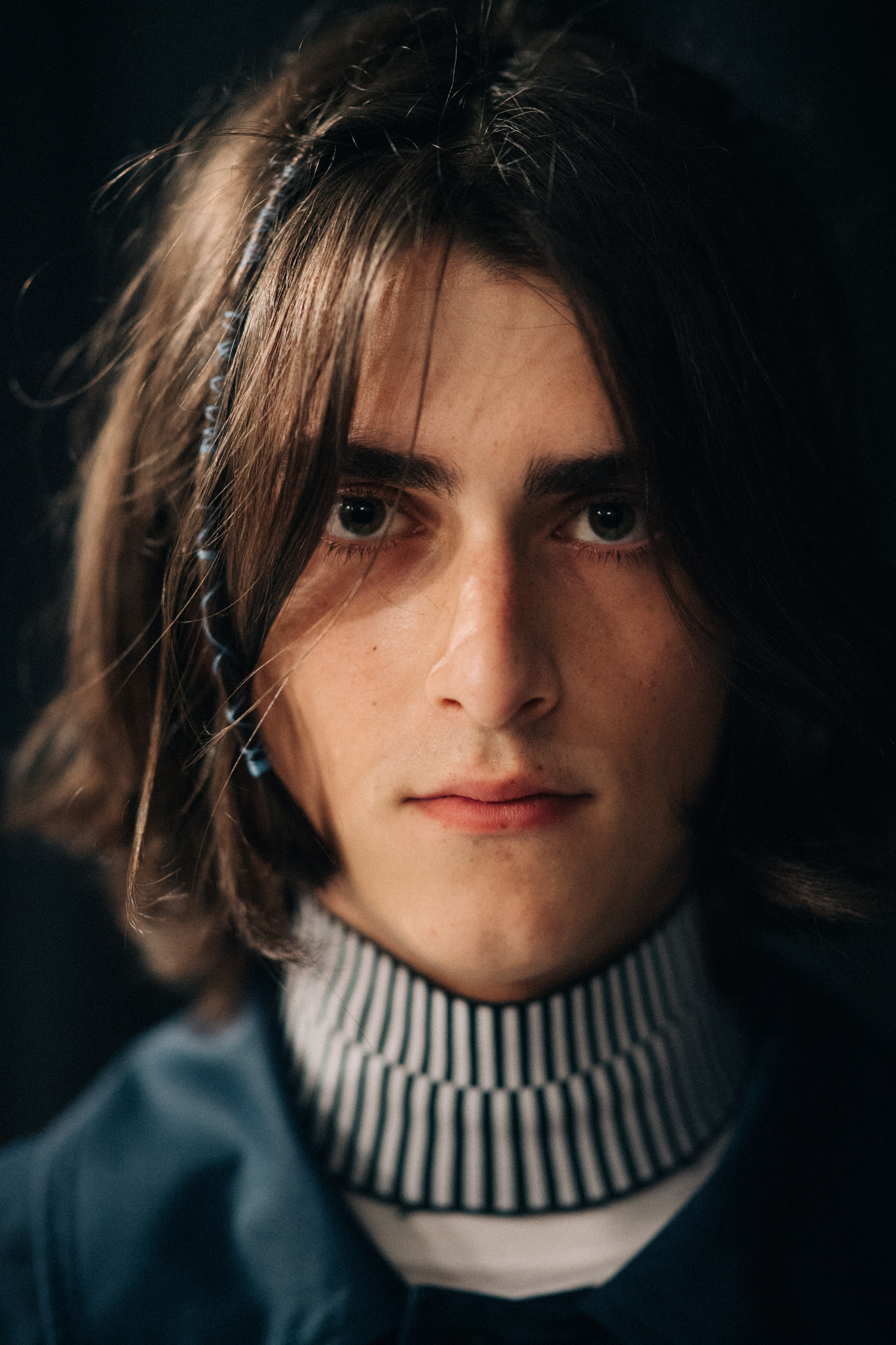 Portrait of a male model before a show