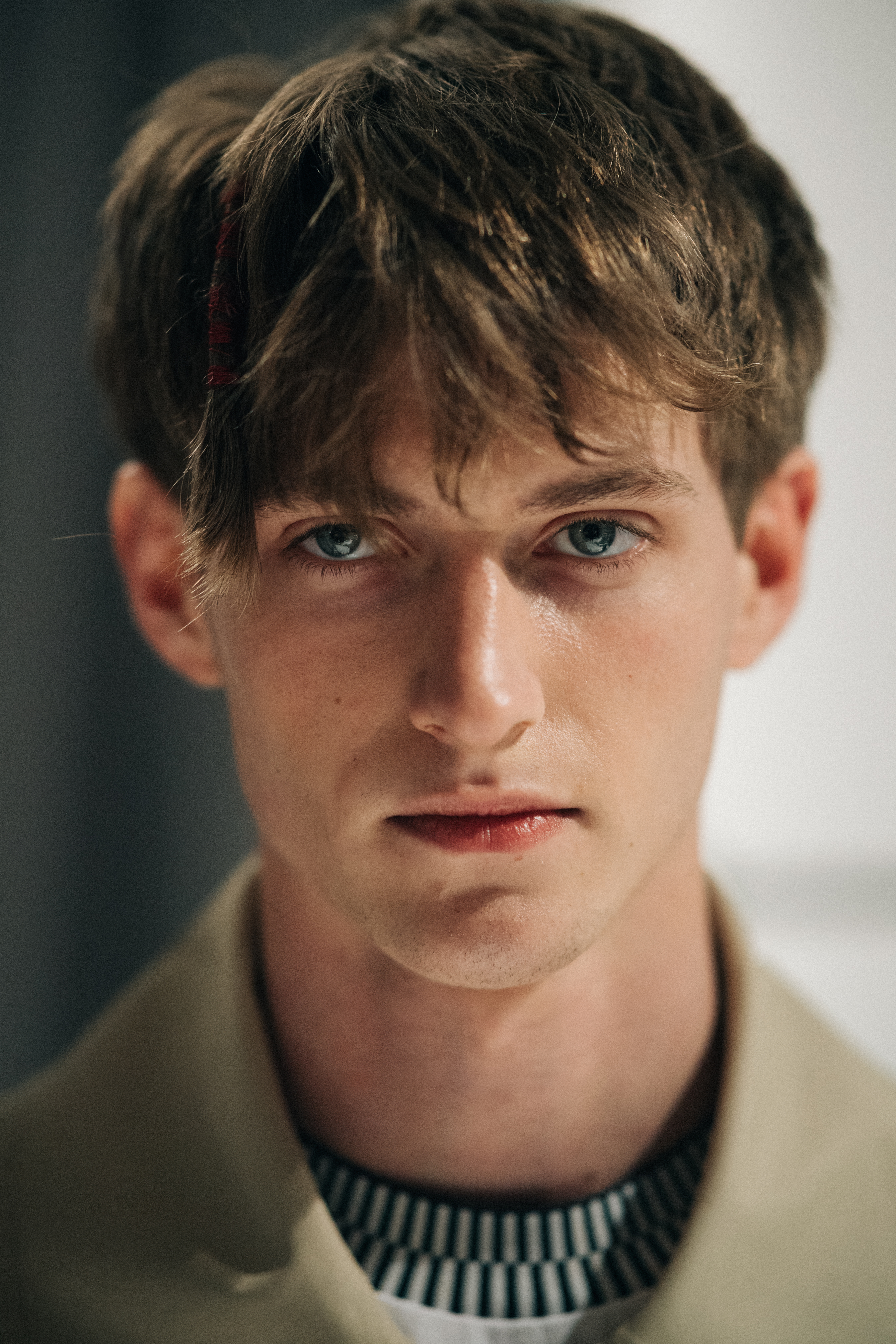 Portrait of a male model before a show