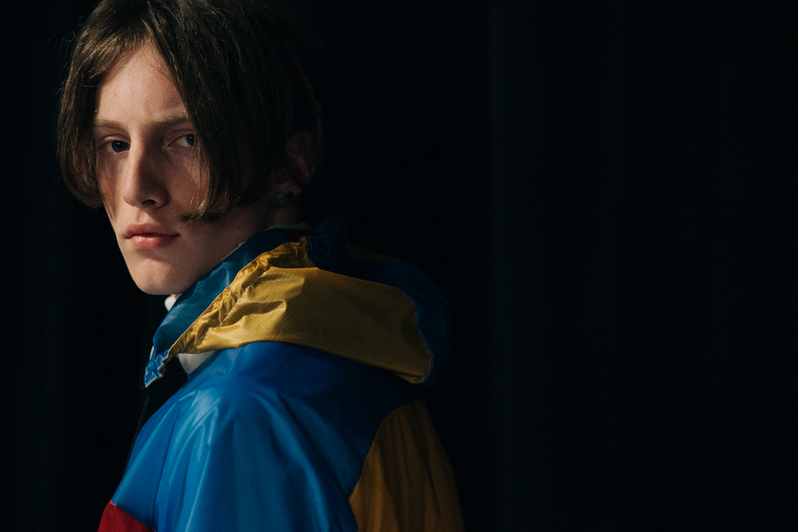 Male model wearing blue sport jacket