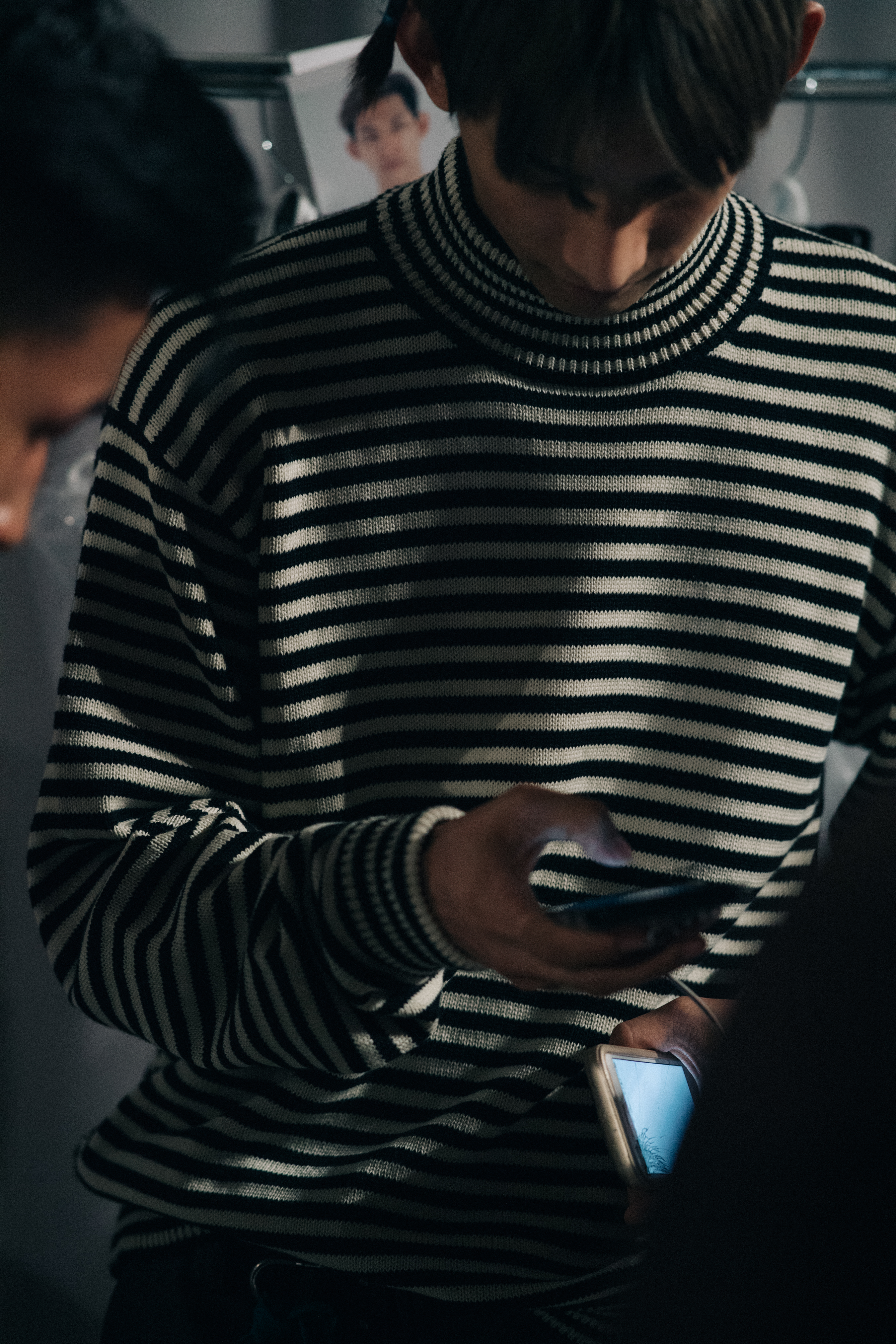 Male model wearing striped shirt