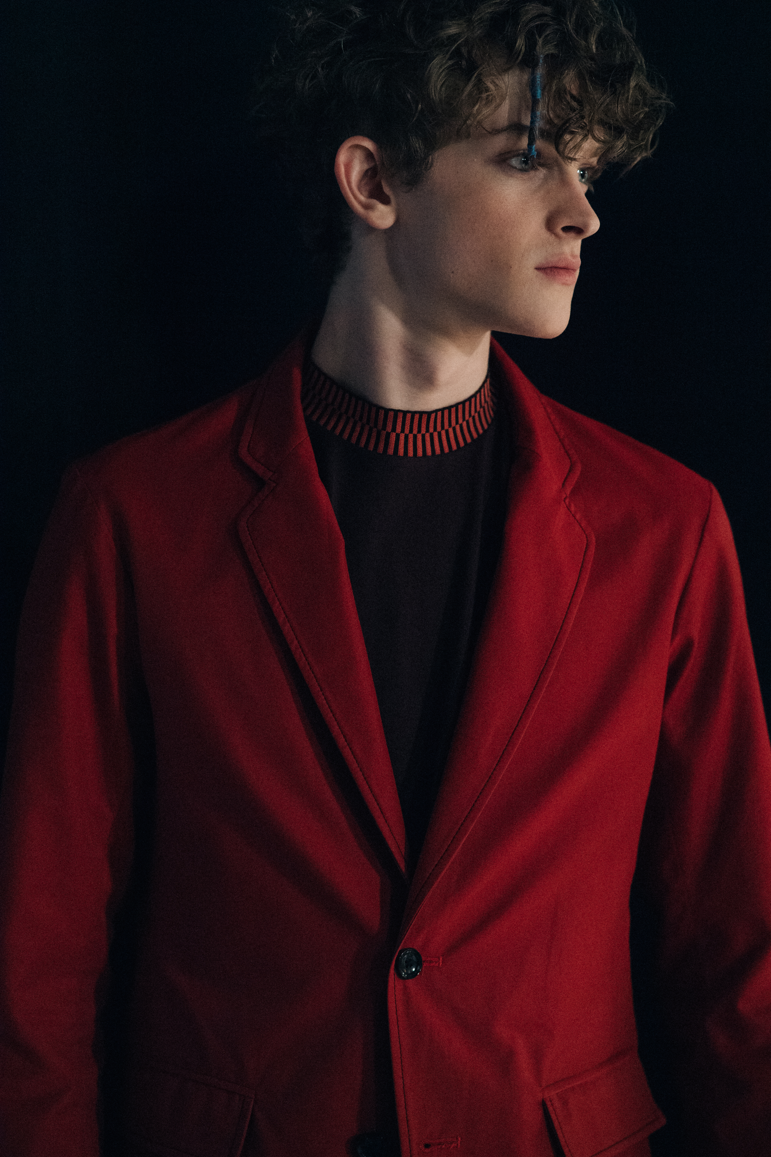 Male model wearing red outfit