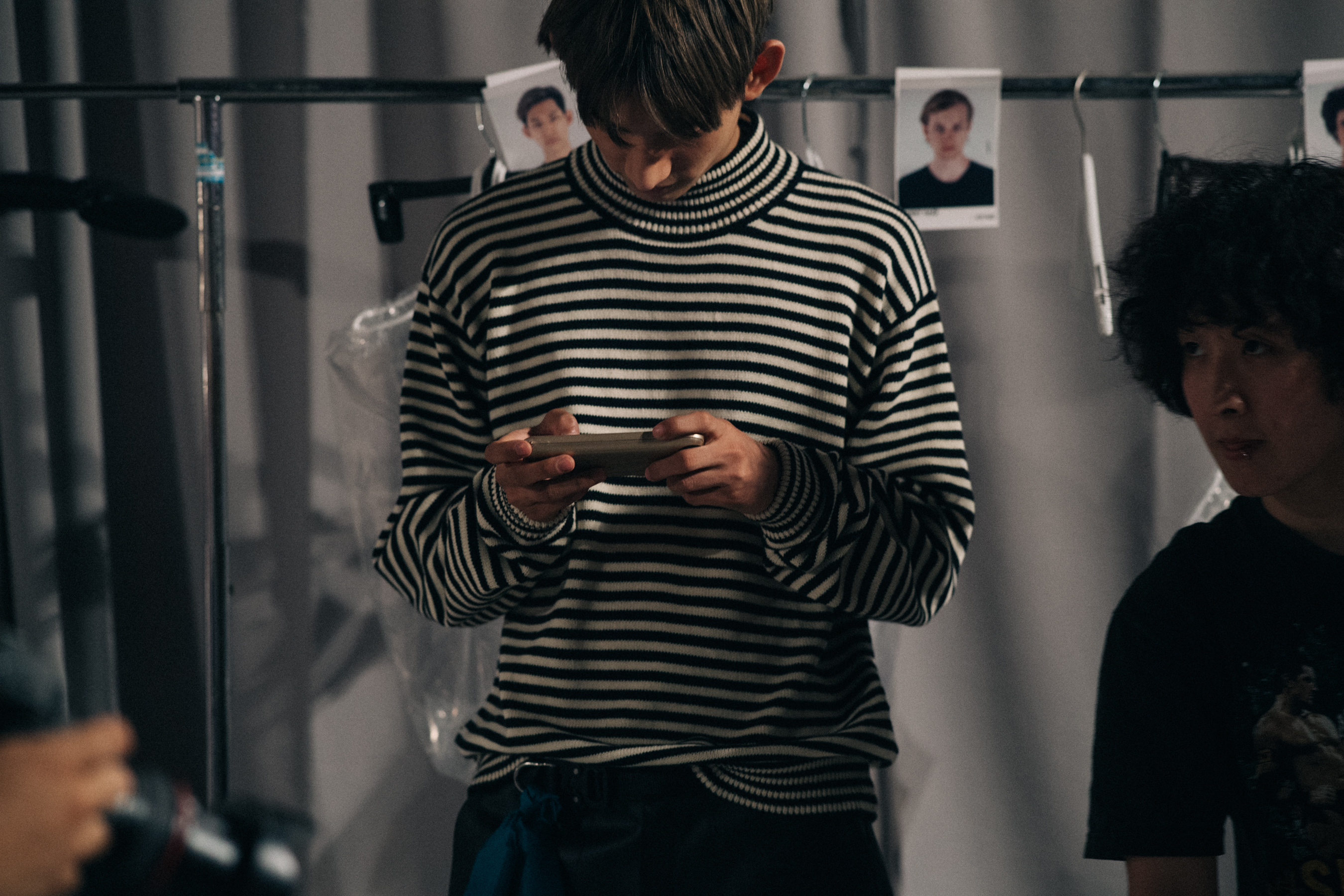 Male model wearing striped shirt
