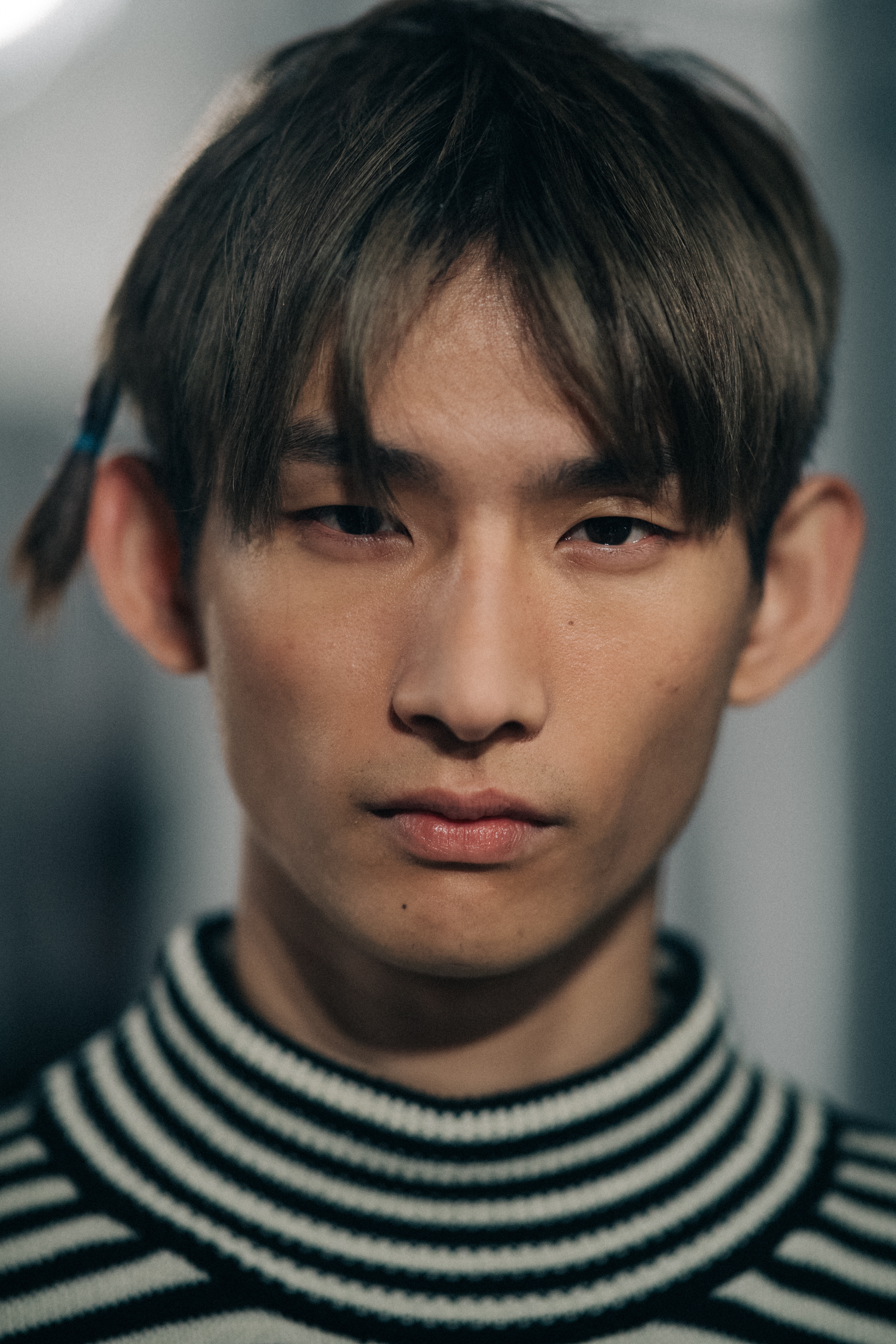 Portrait of a male model before a show