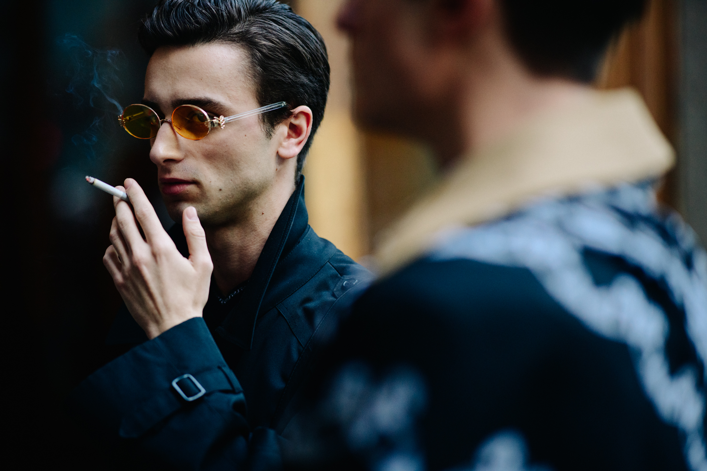 Man wearing orange sunglasses
