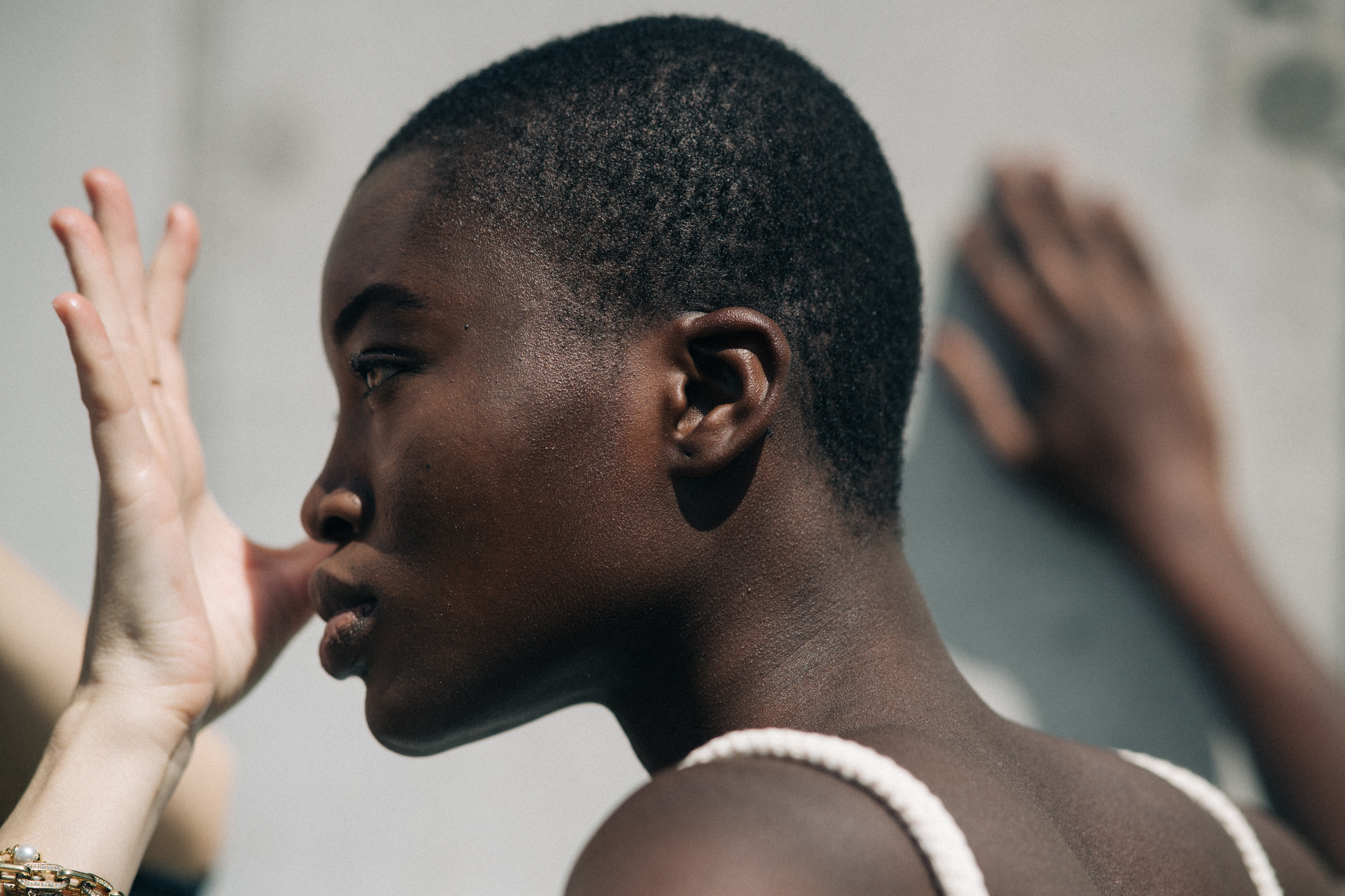 Model getting make up done
