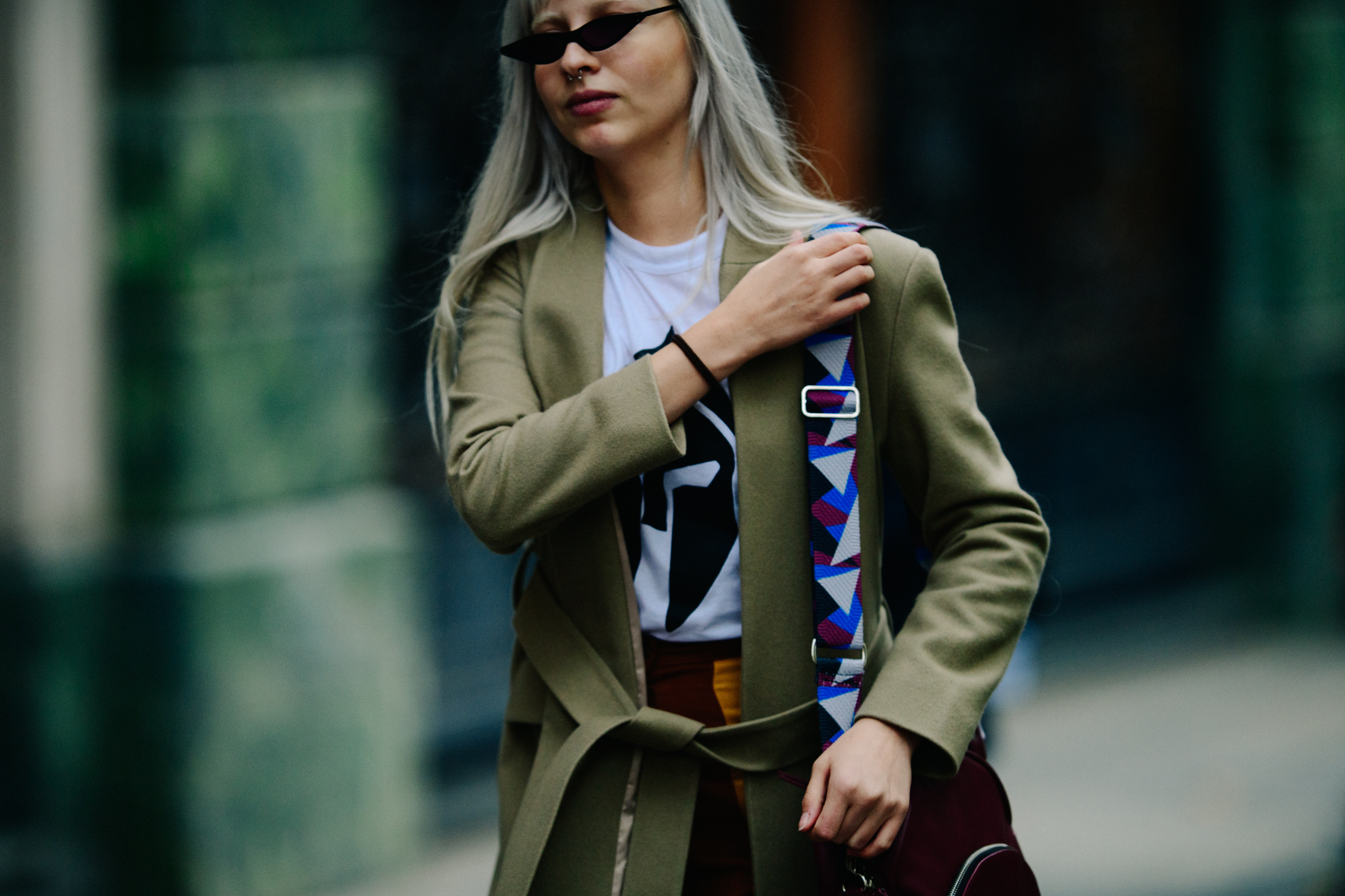 Woman wearing green wool coat