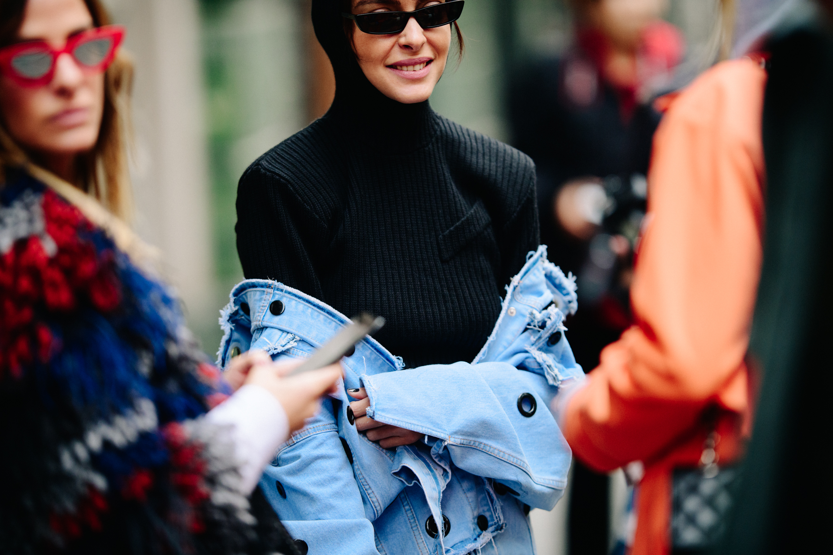 Woman wearing black wool top