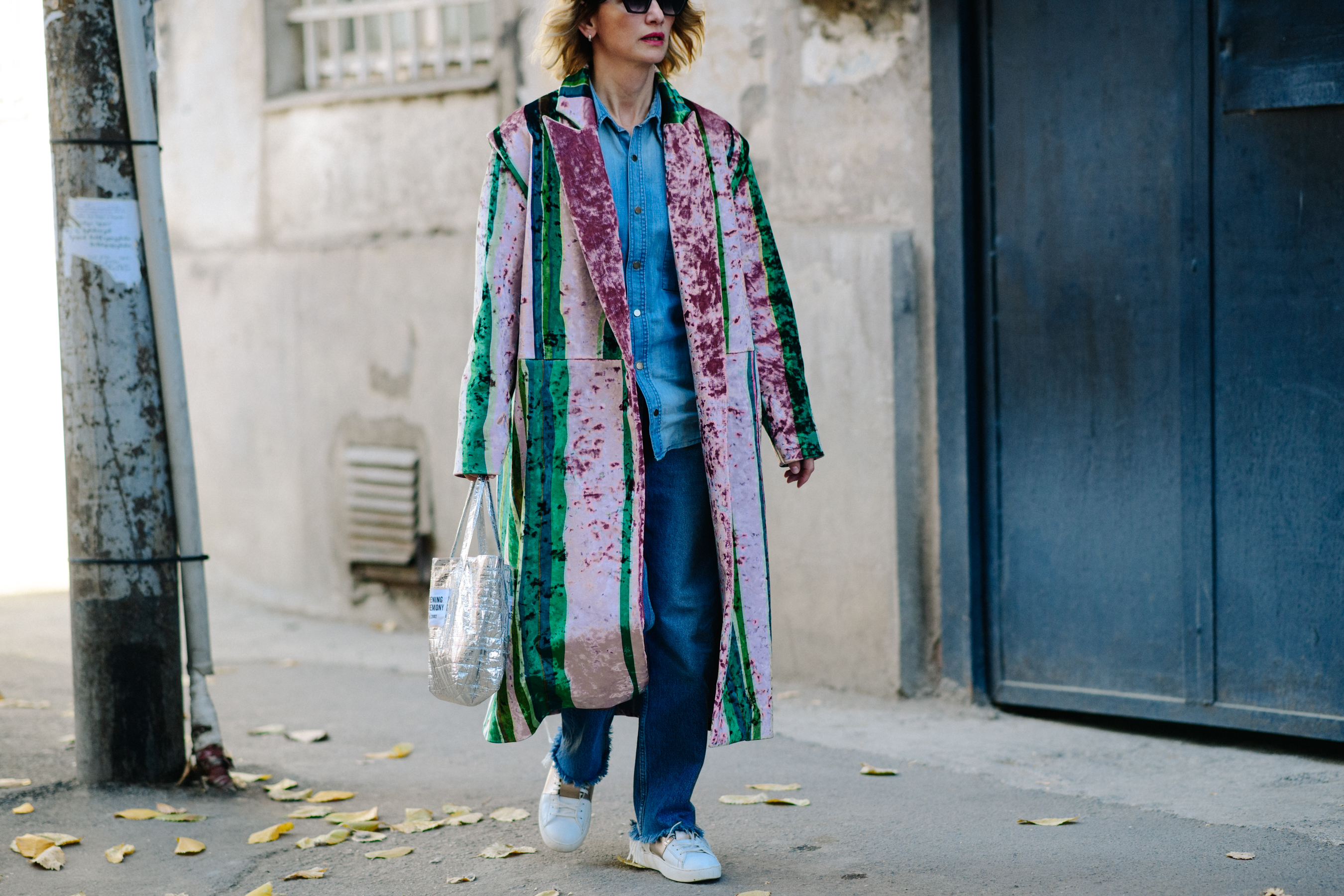 Woman wearing pink and blue coat