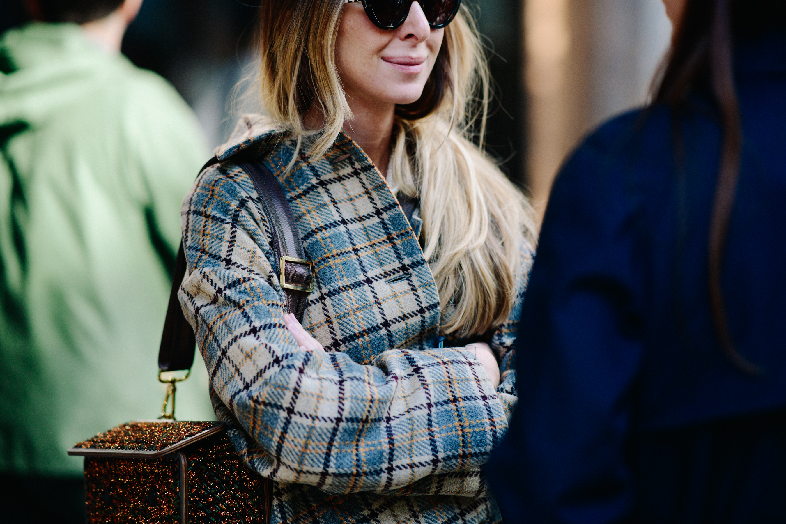 Girl wearing blue checkered coat
