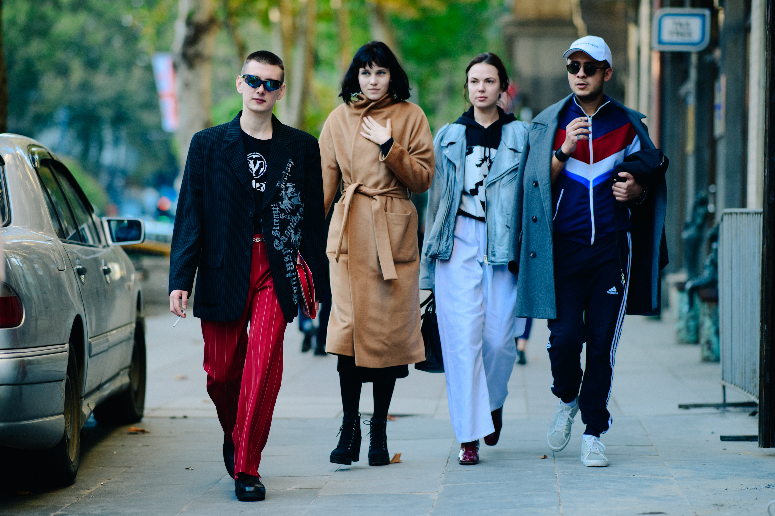 Four people wearing coats