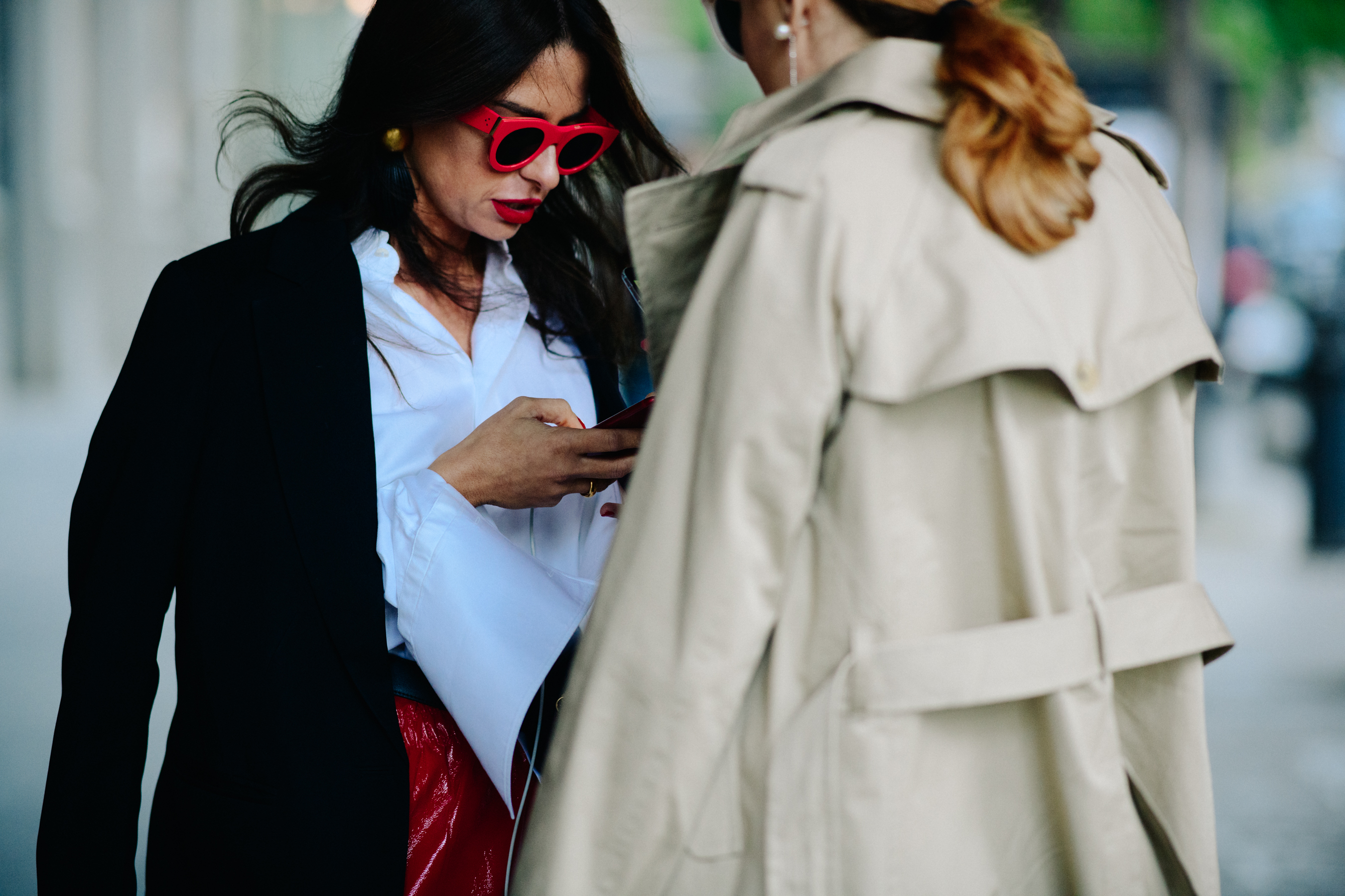 Girl wearing red sunglasses