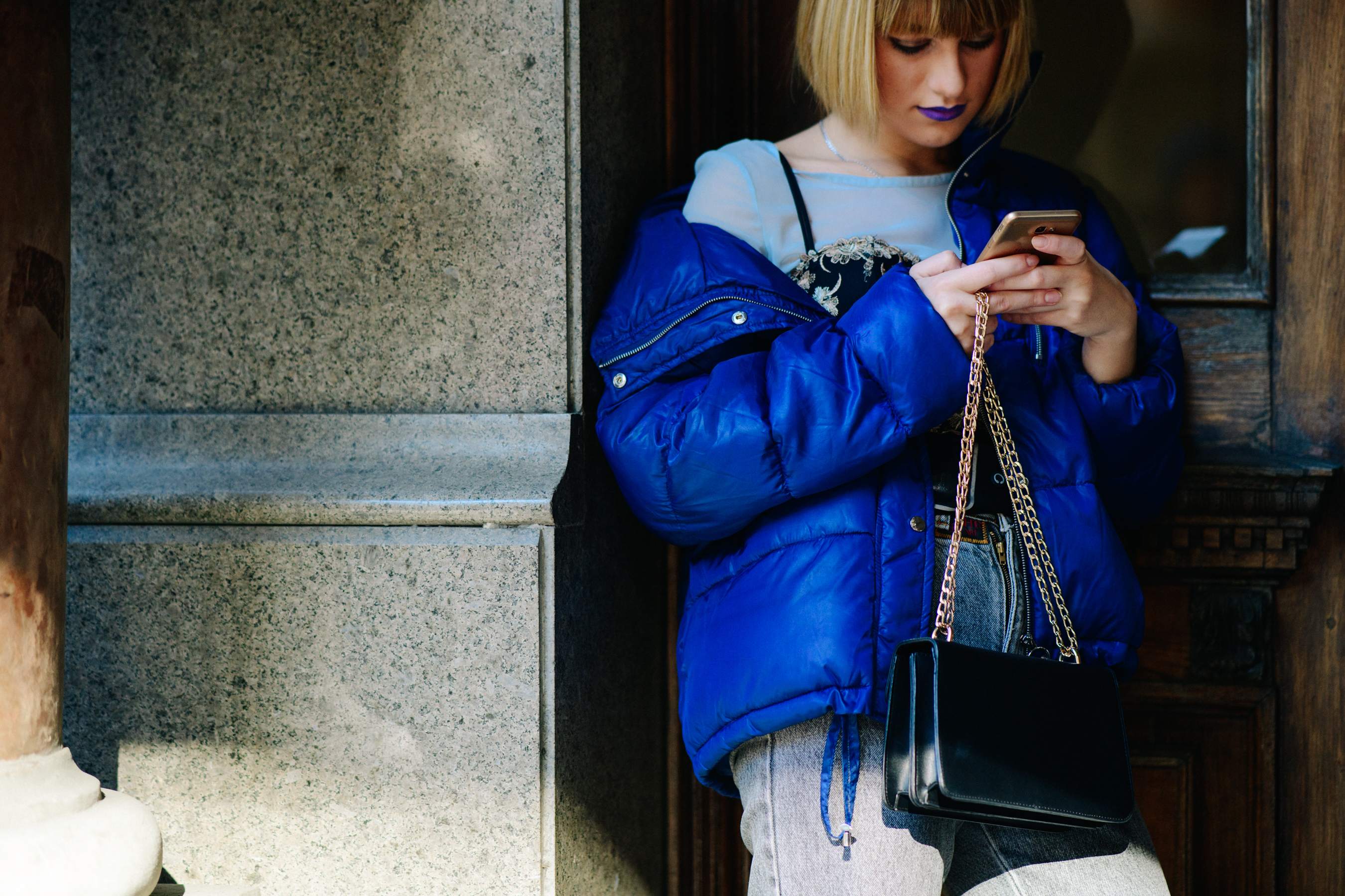 Girl wearing blue puffer coat