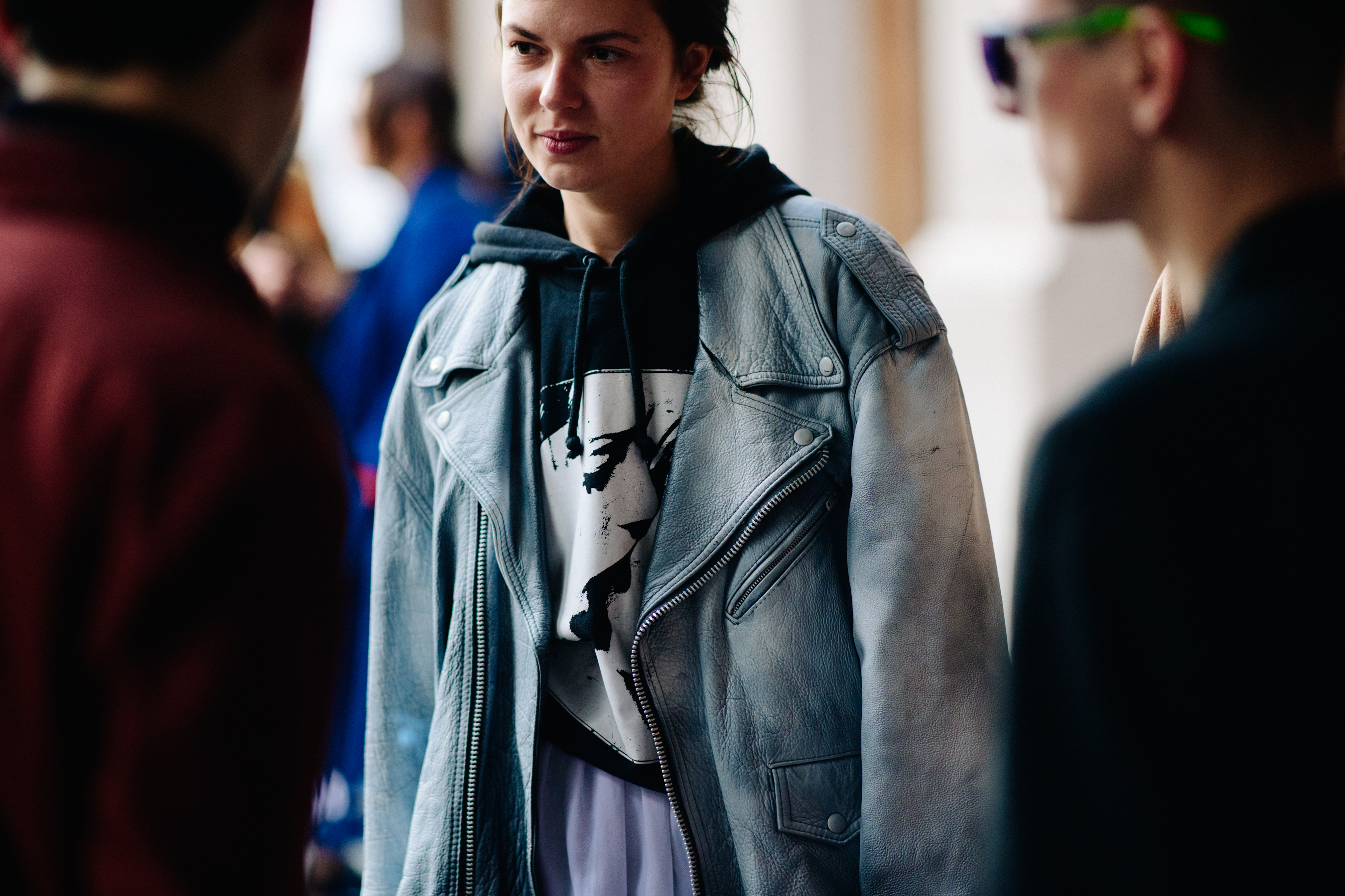 Girl wearing silver leather jacket