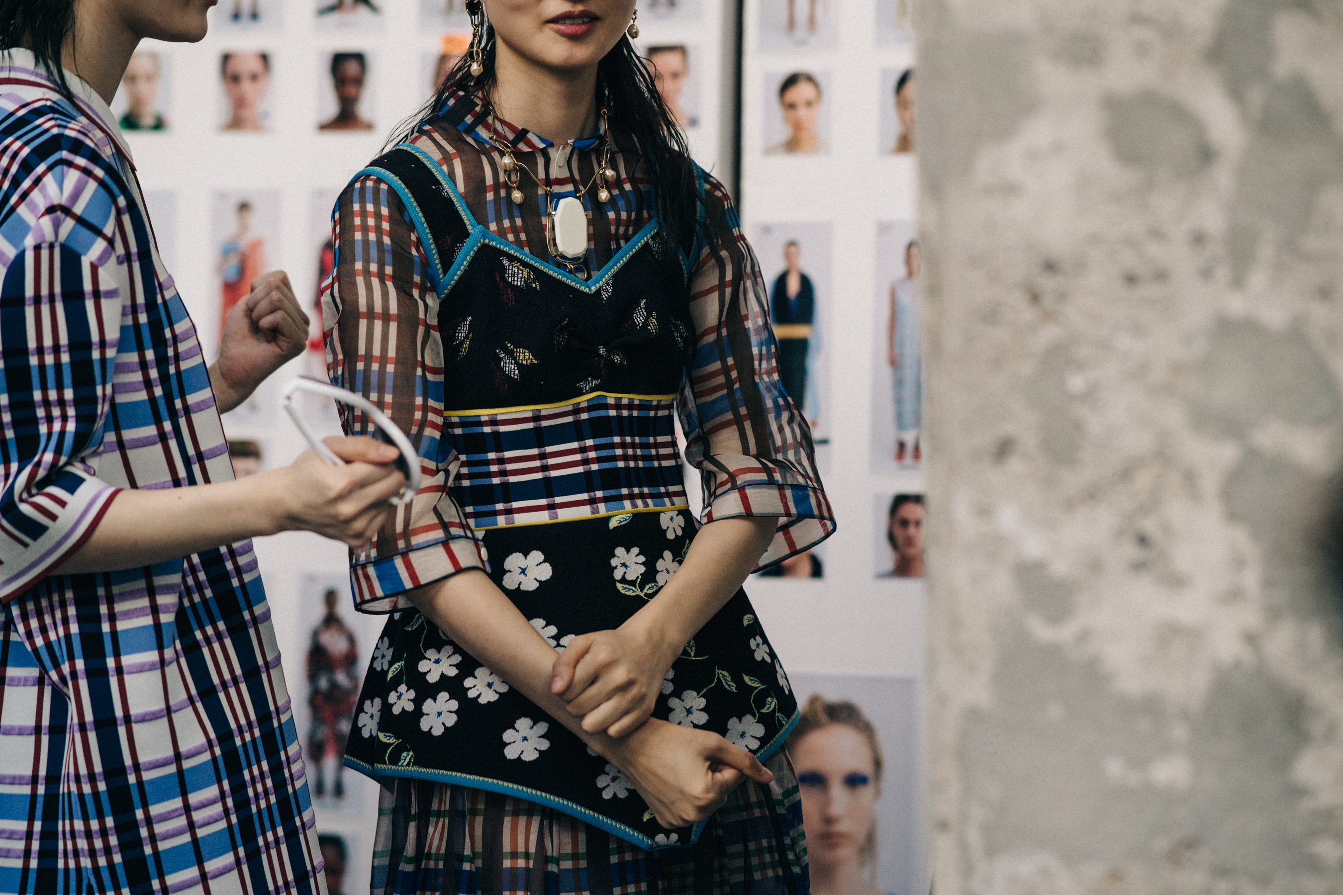 Crop of model in coloured check top