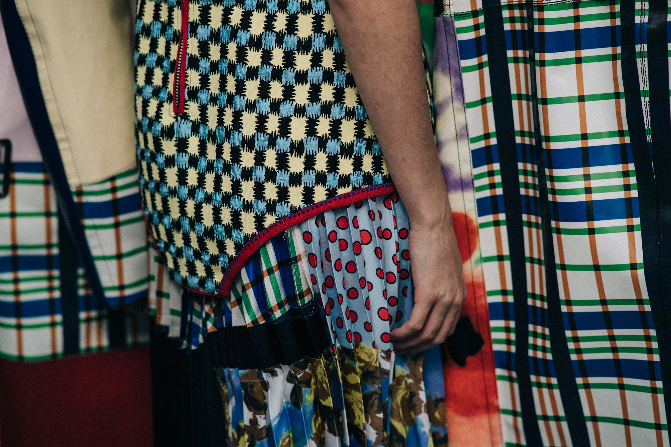 Closeup of model in coloured clothes