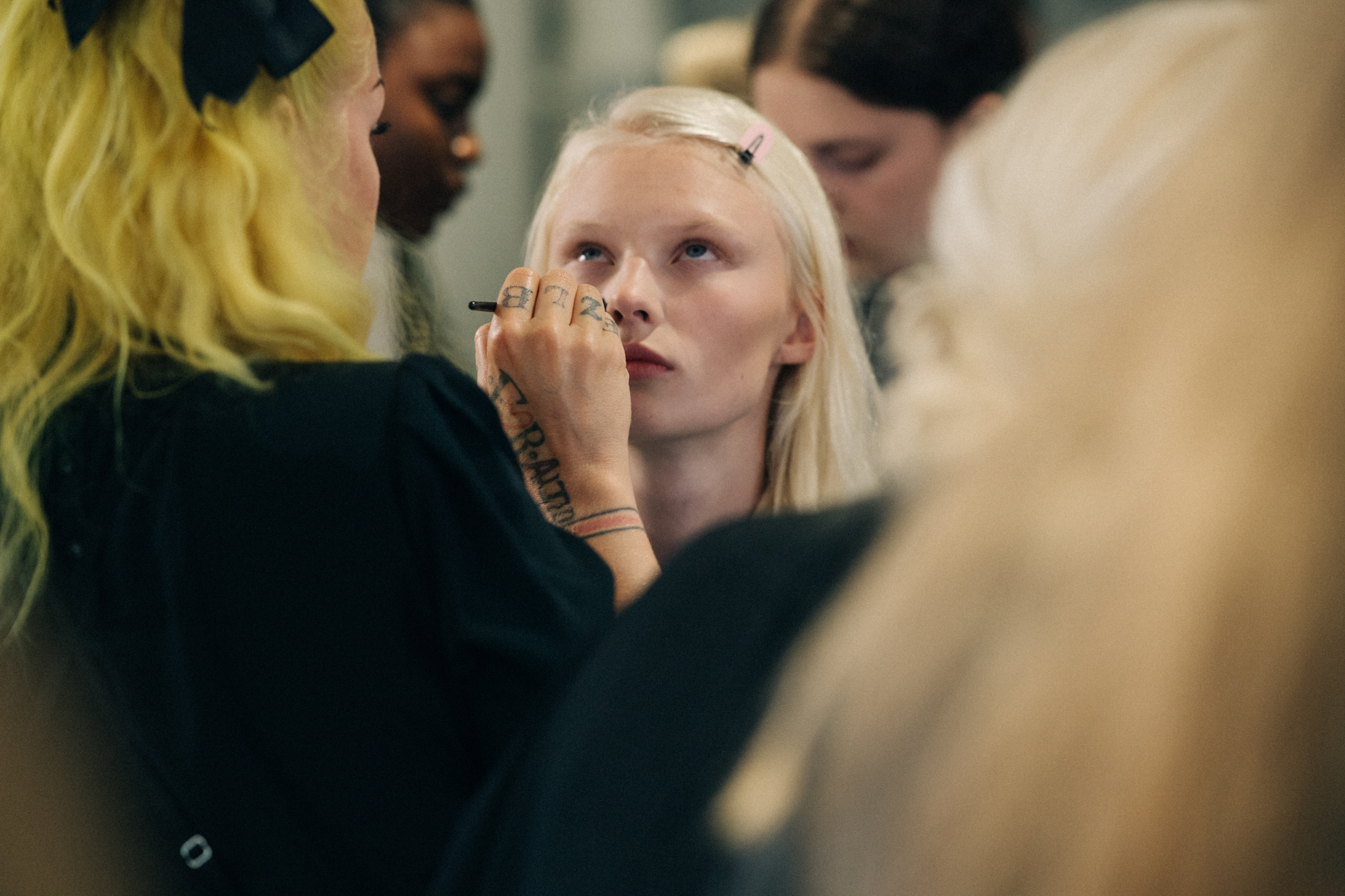Model getting hair and make up done