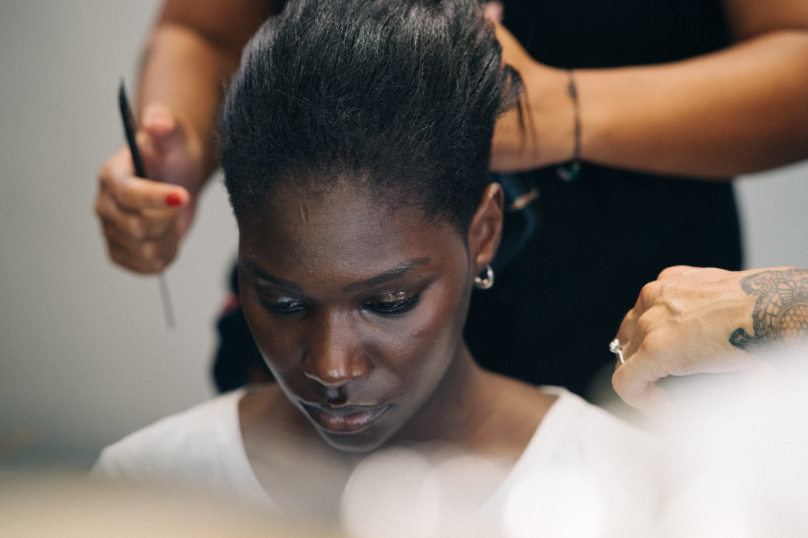 Model getting hair and make up done