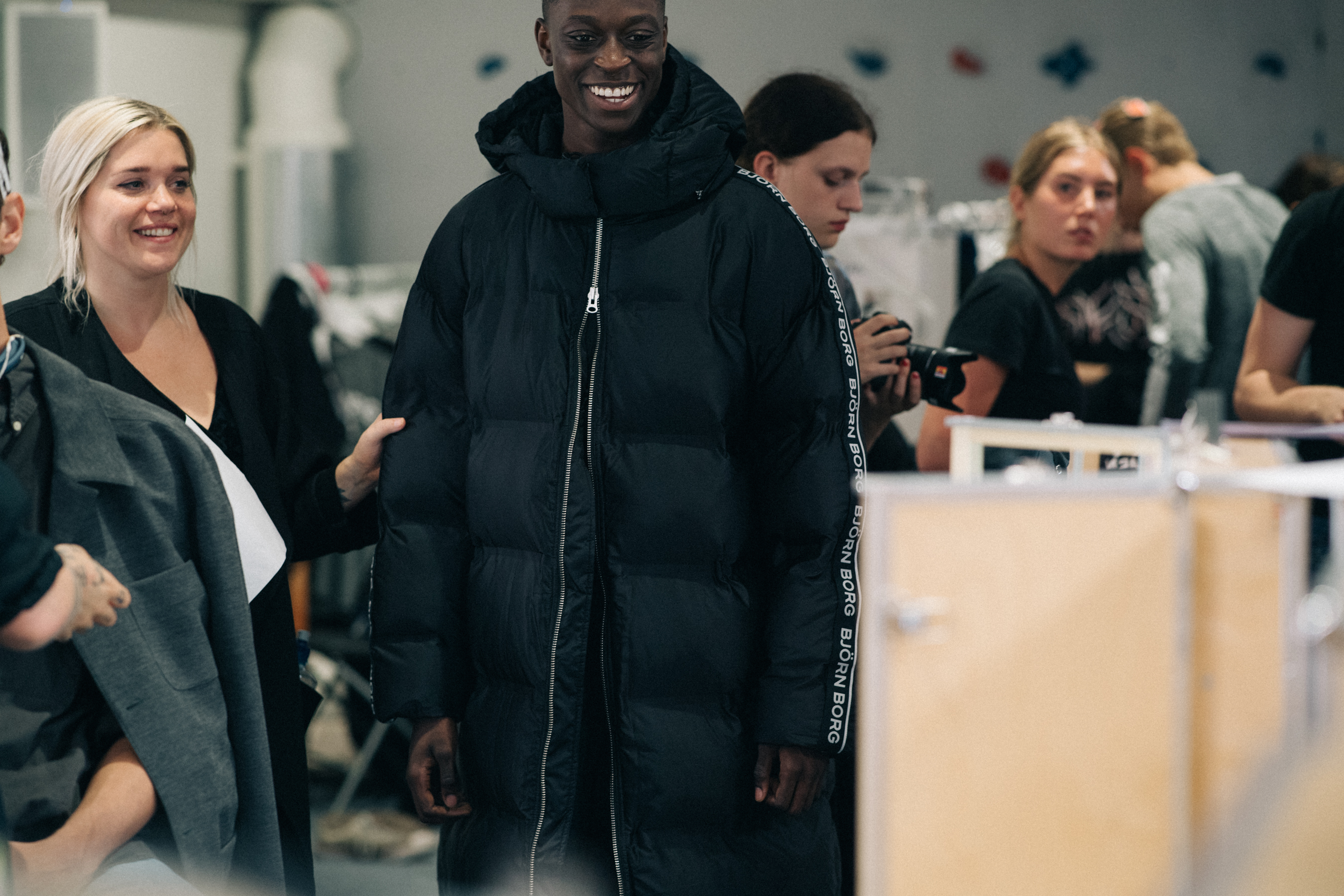 Male model wearing black puffer jacket