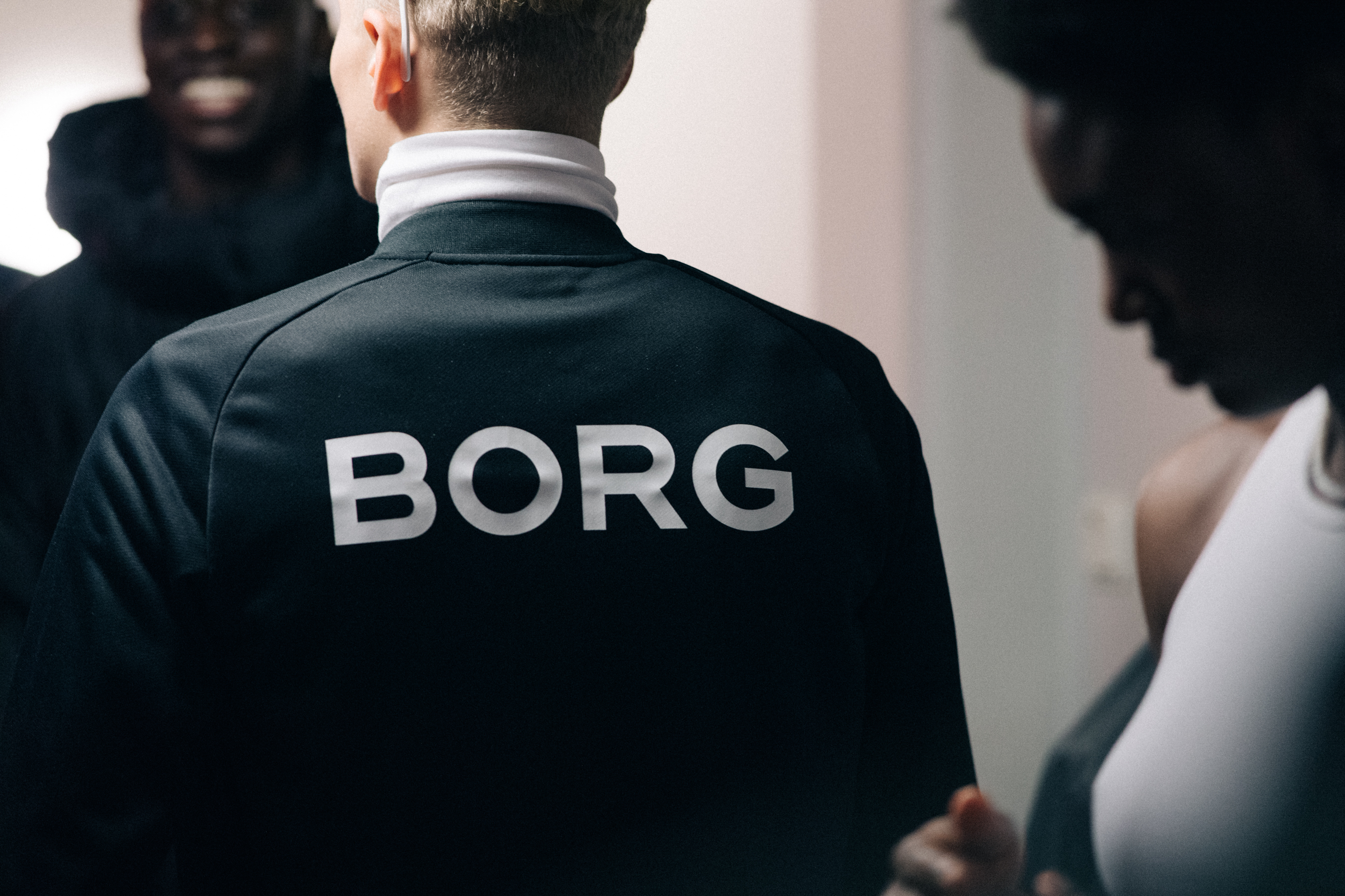 Models wearing sport wear before a show