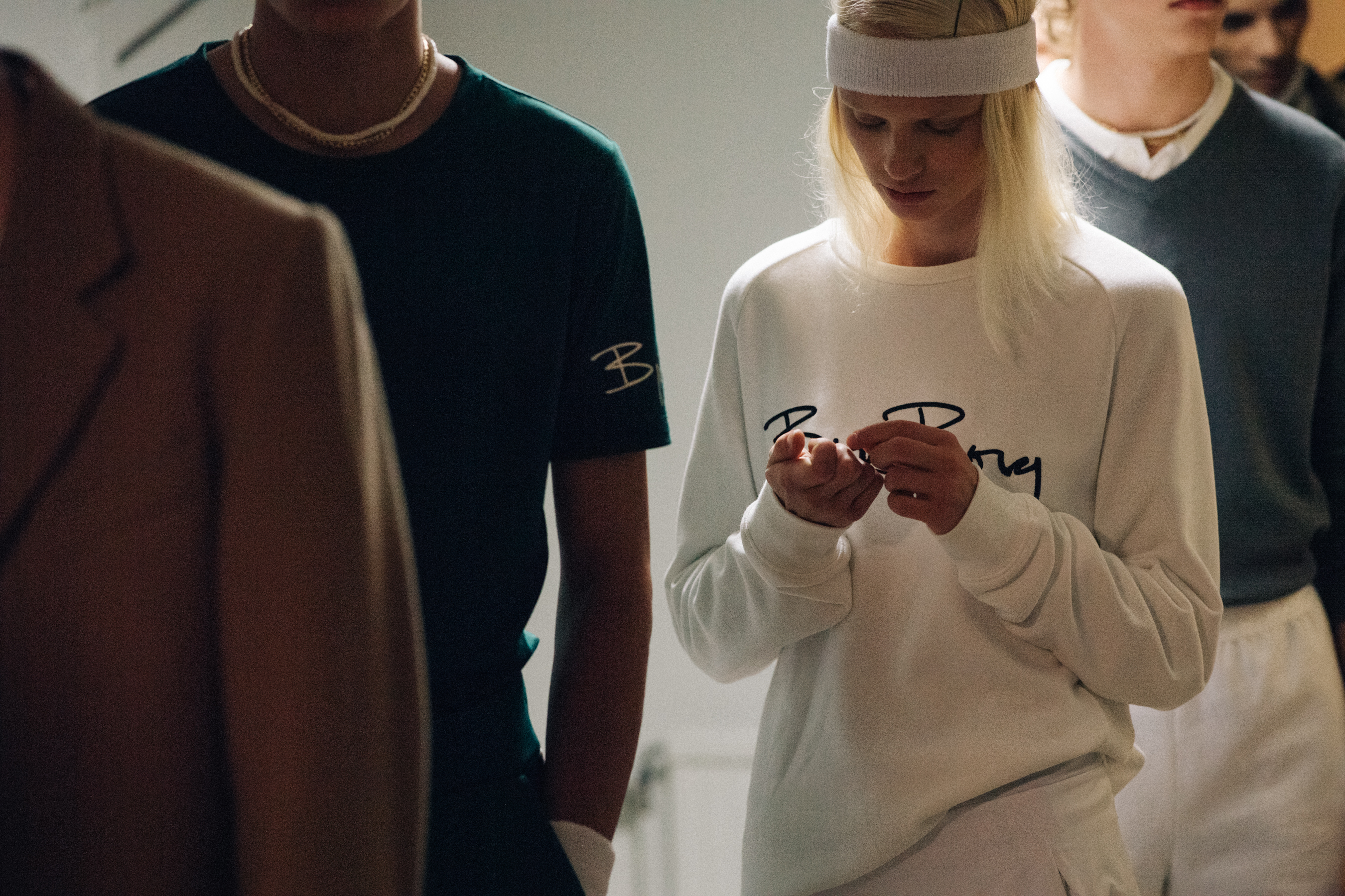 Models wearing sport wear before a show