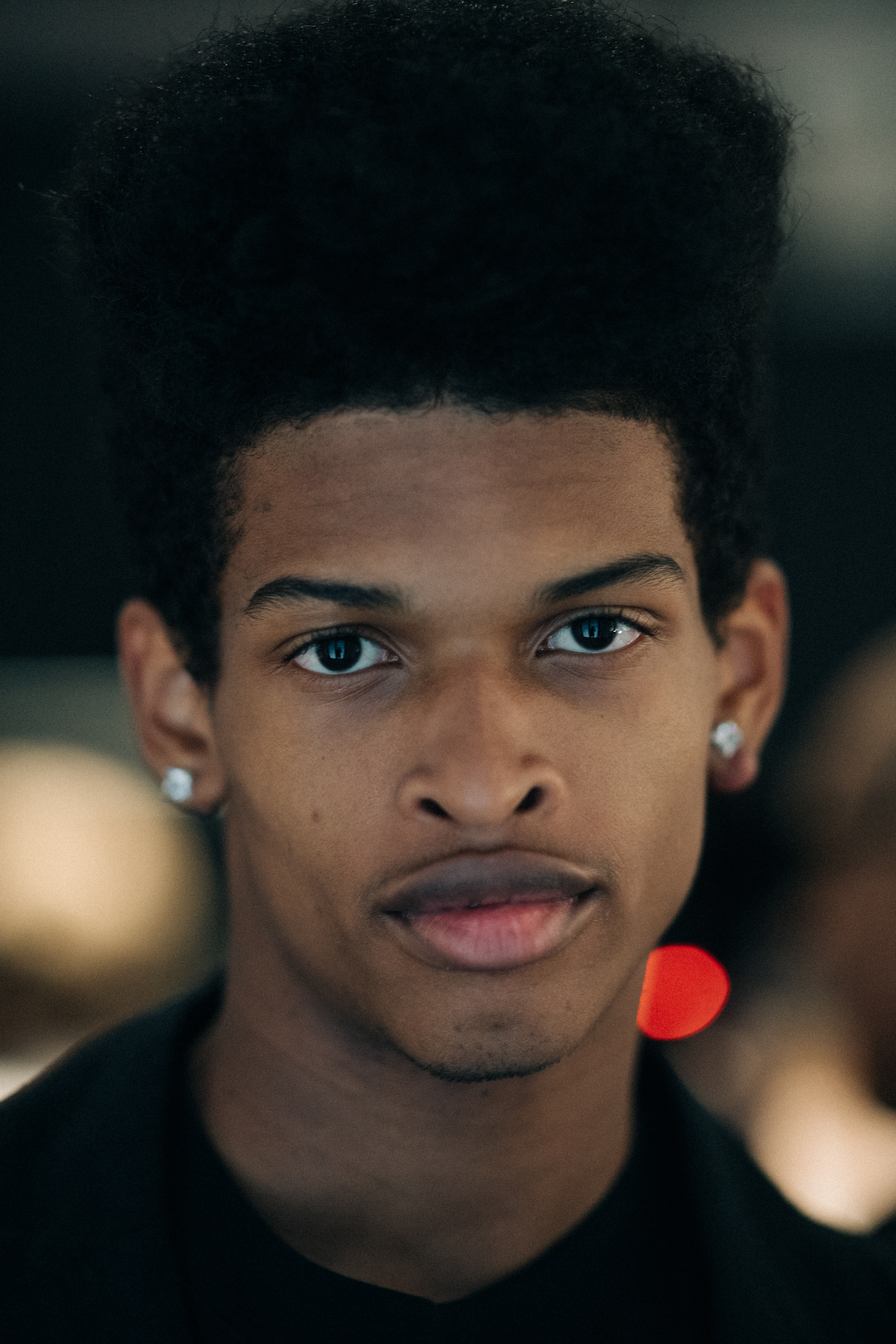 Porrait of a male model with curly hair