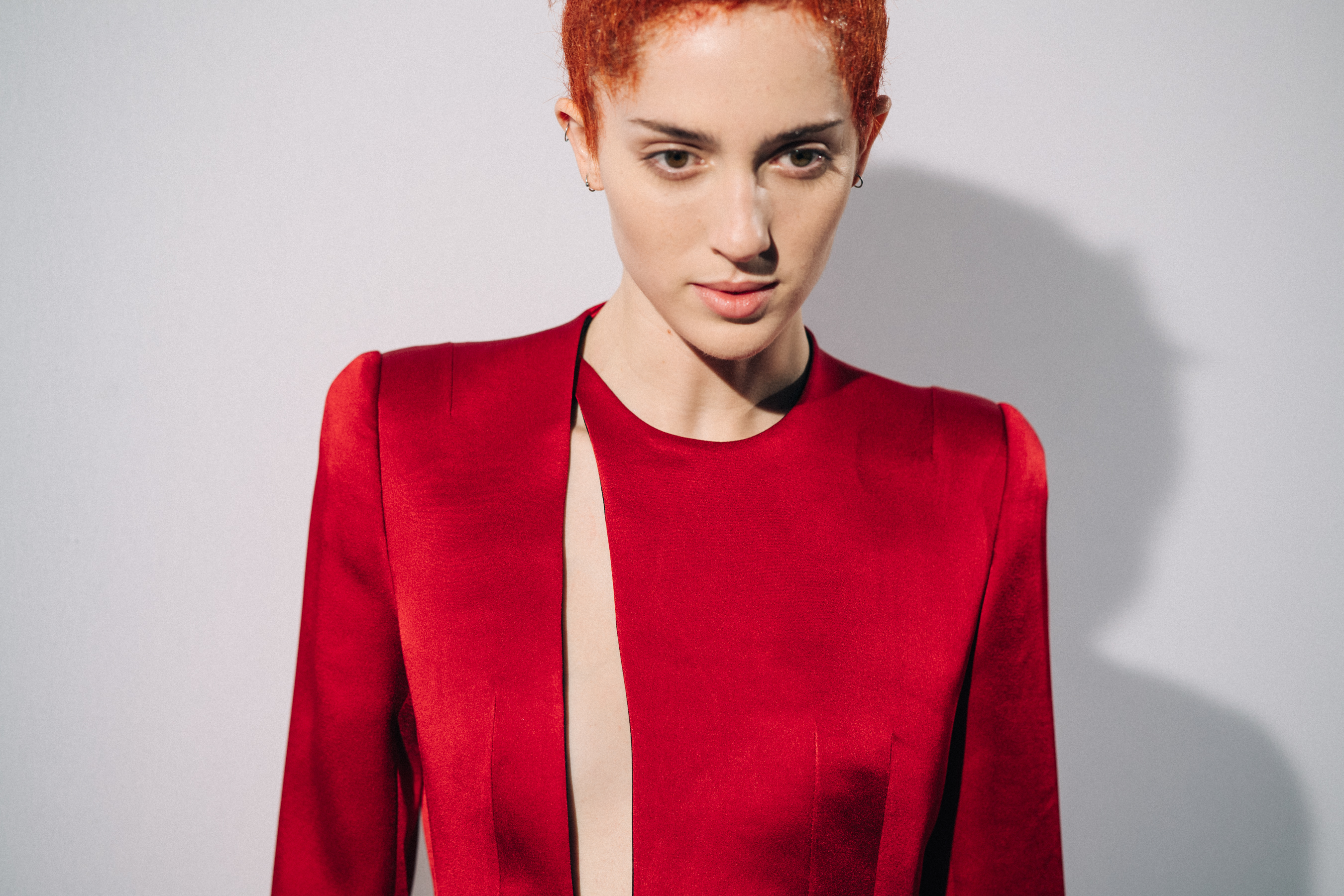 Model wearing red before a show