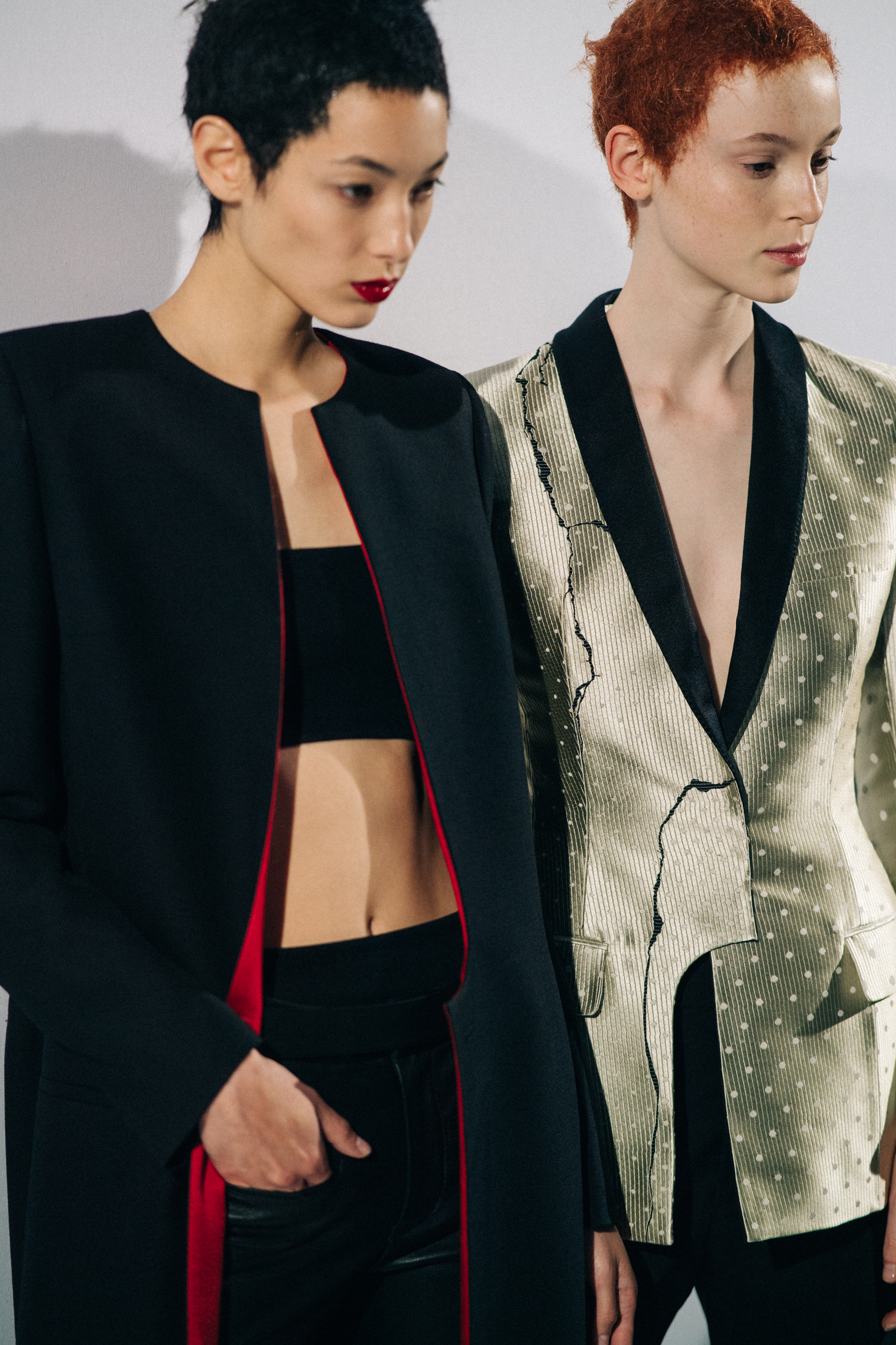 Model wearing black before a show