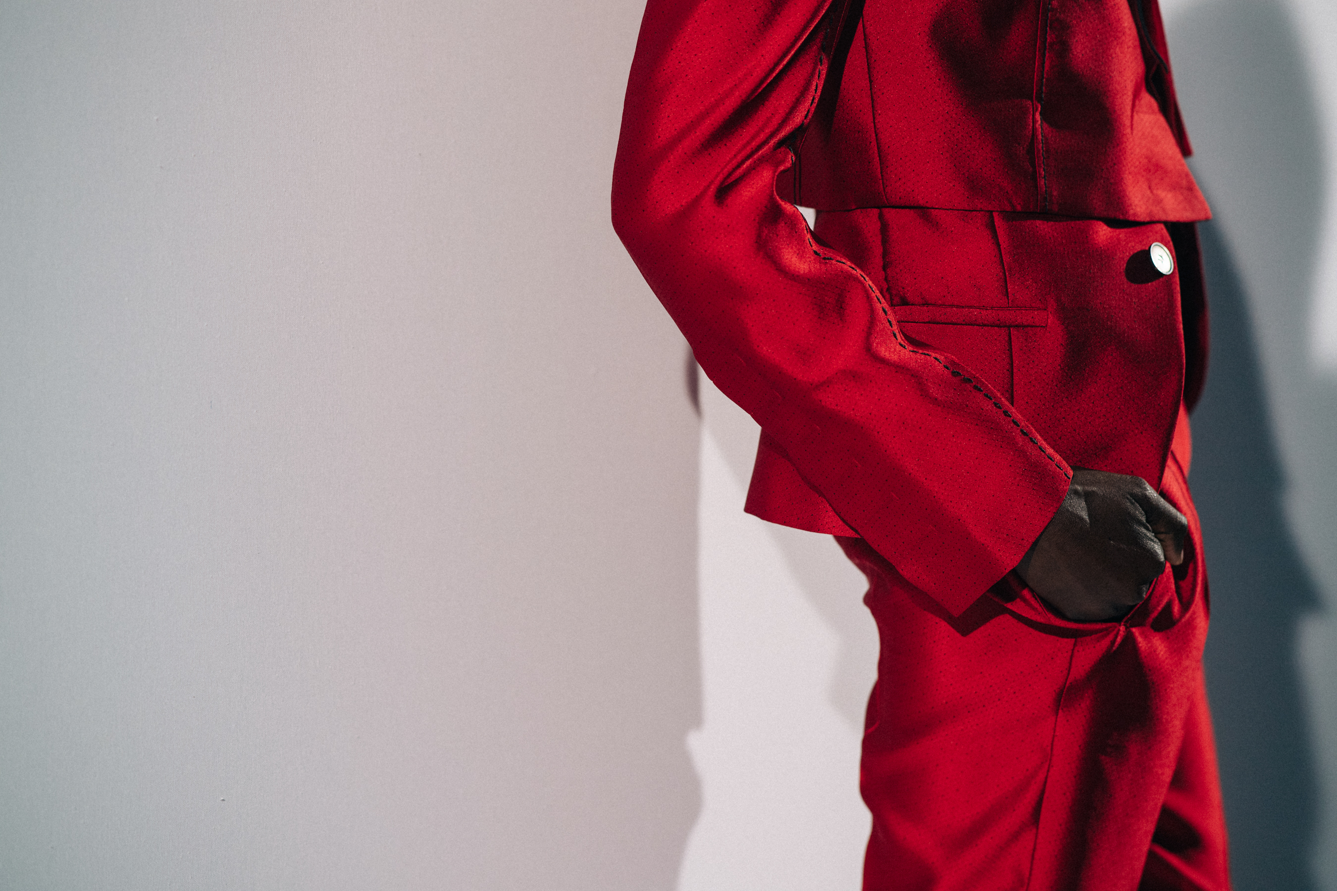 Model wearing red before a show
