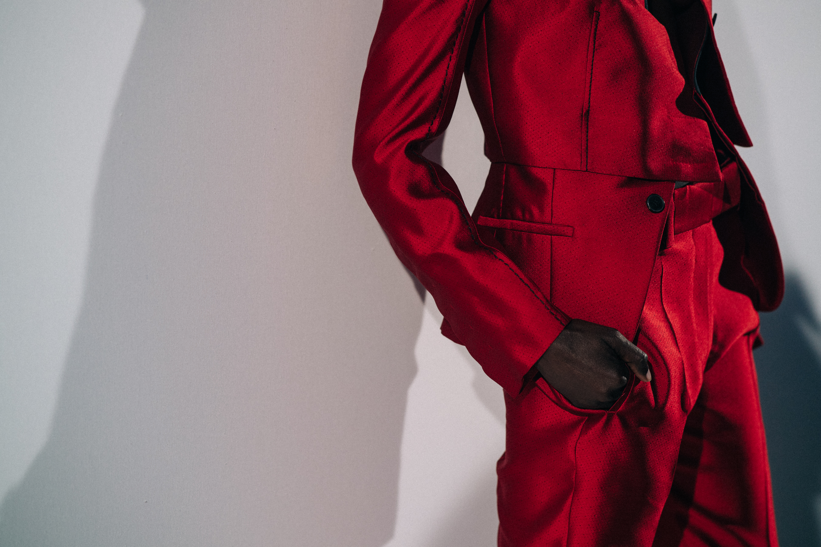 Model wearing red before a show