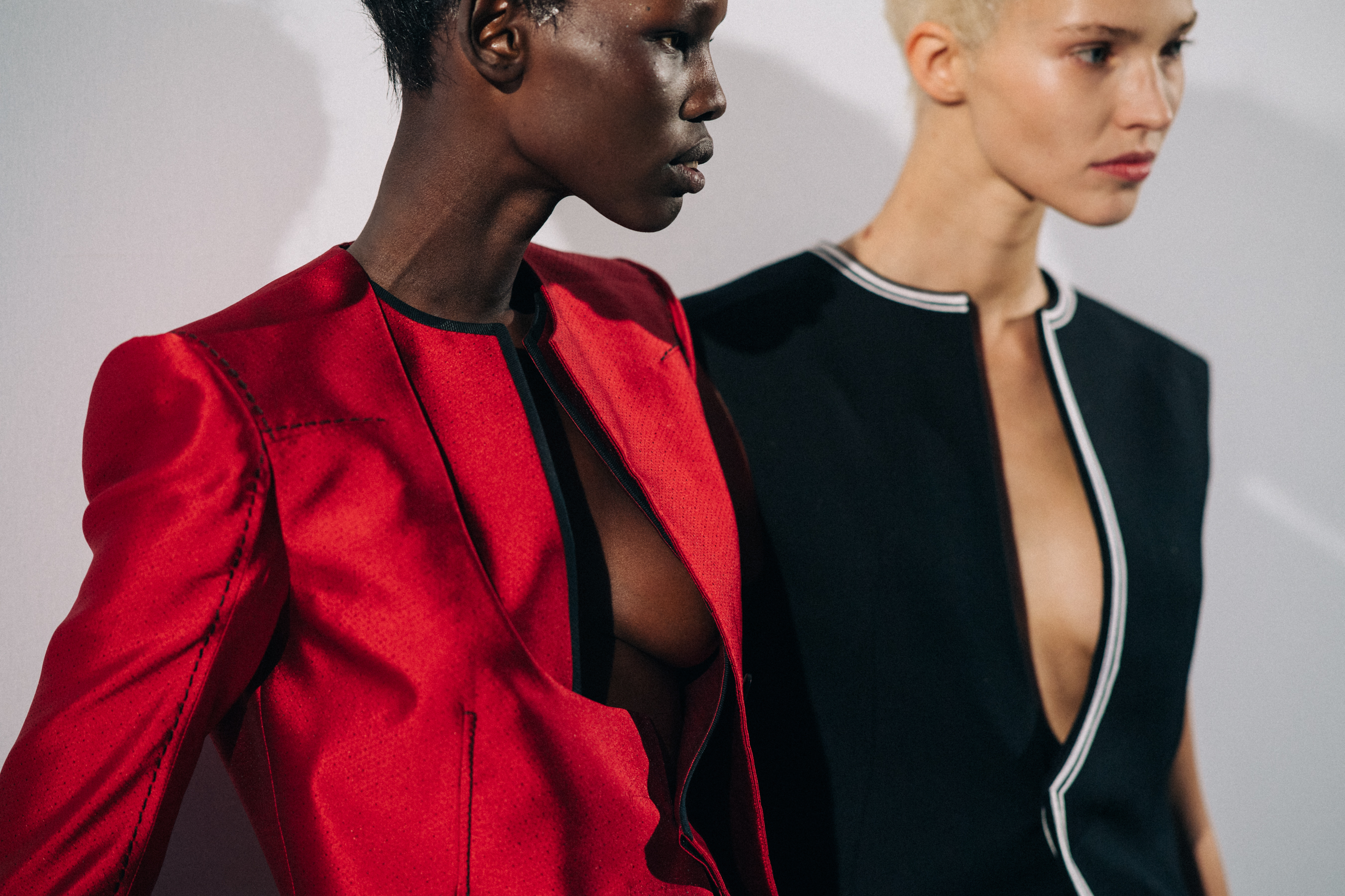 Model wearing red before a show