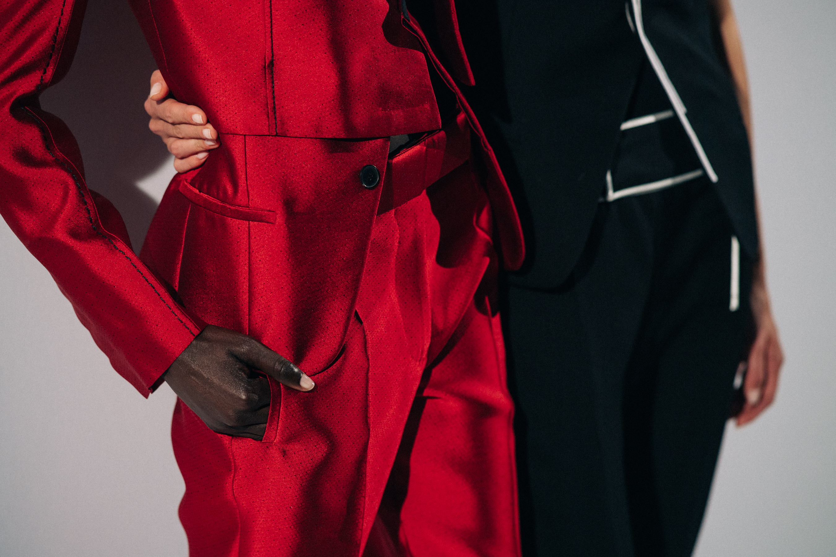 Model wearing red before a show