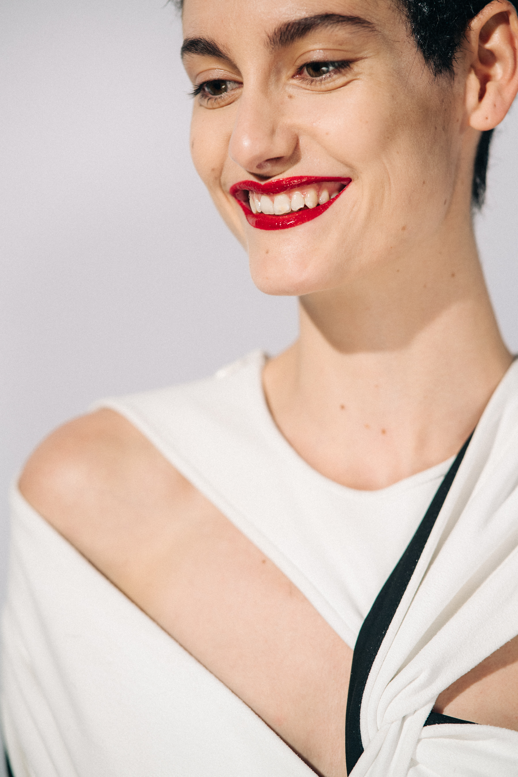 Model wearing white before a show