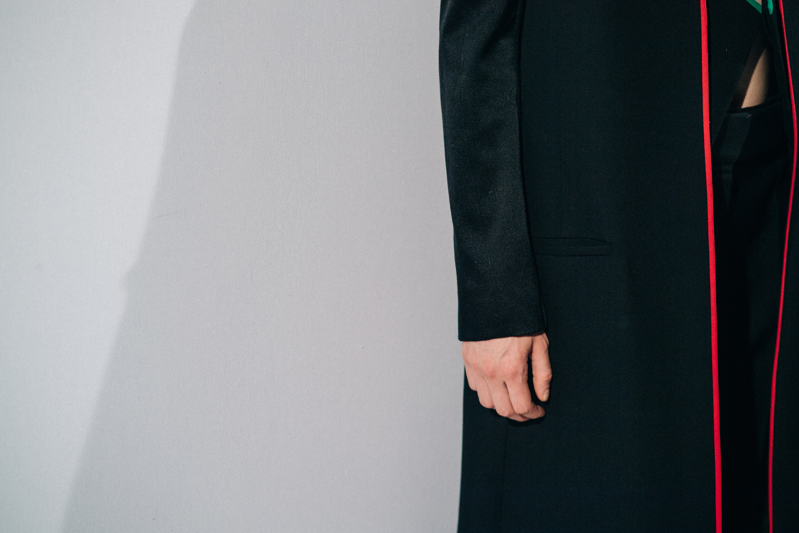 Model wearing black before a show