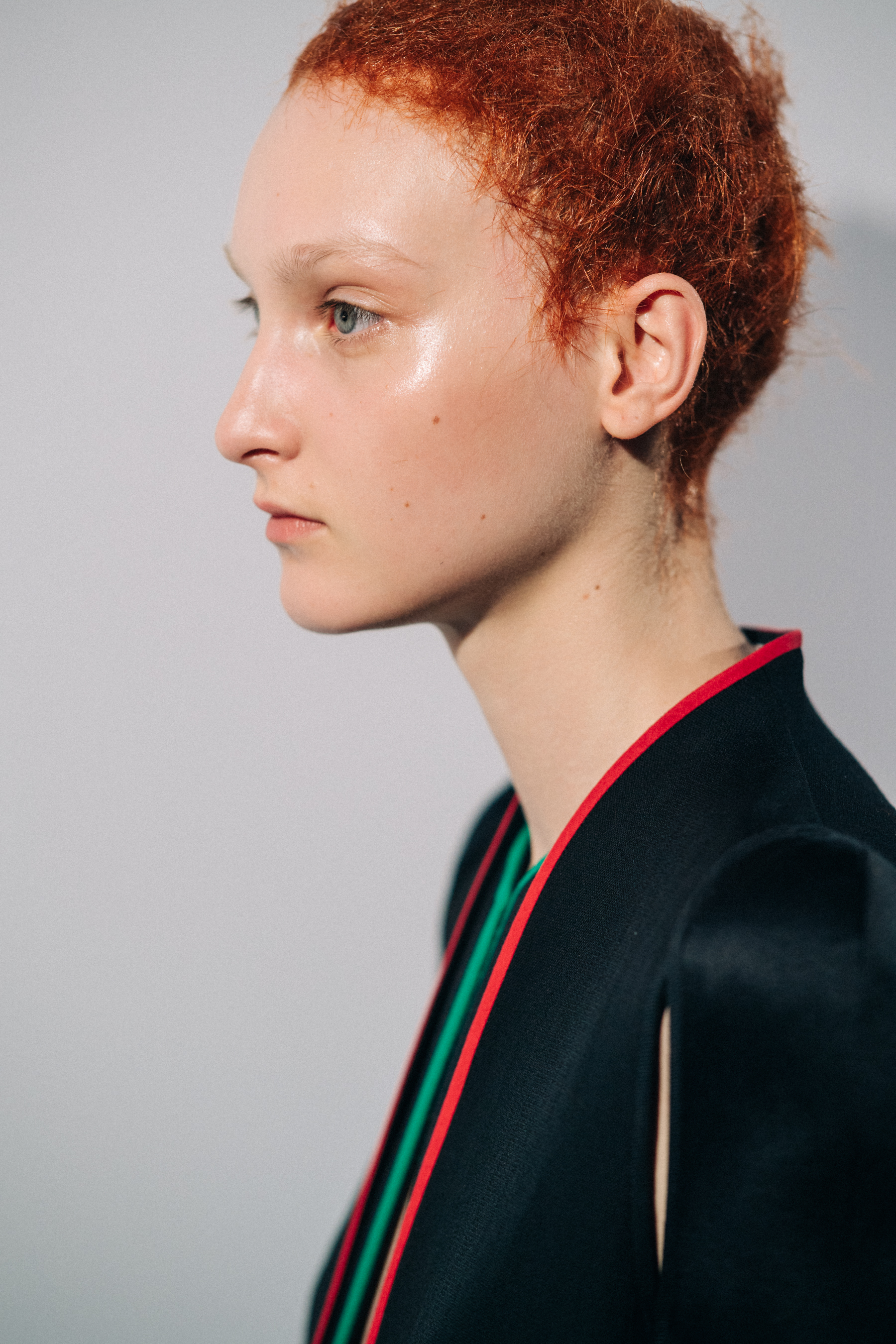 Model wearing black before a show