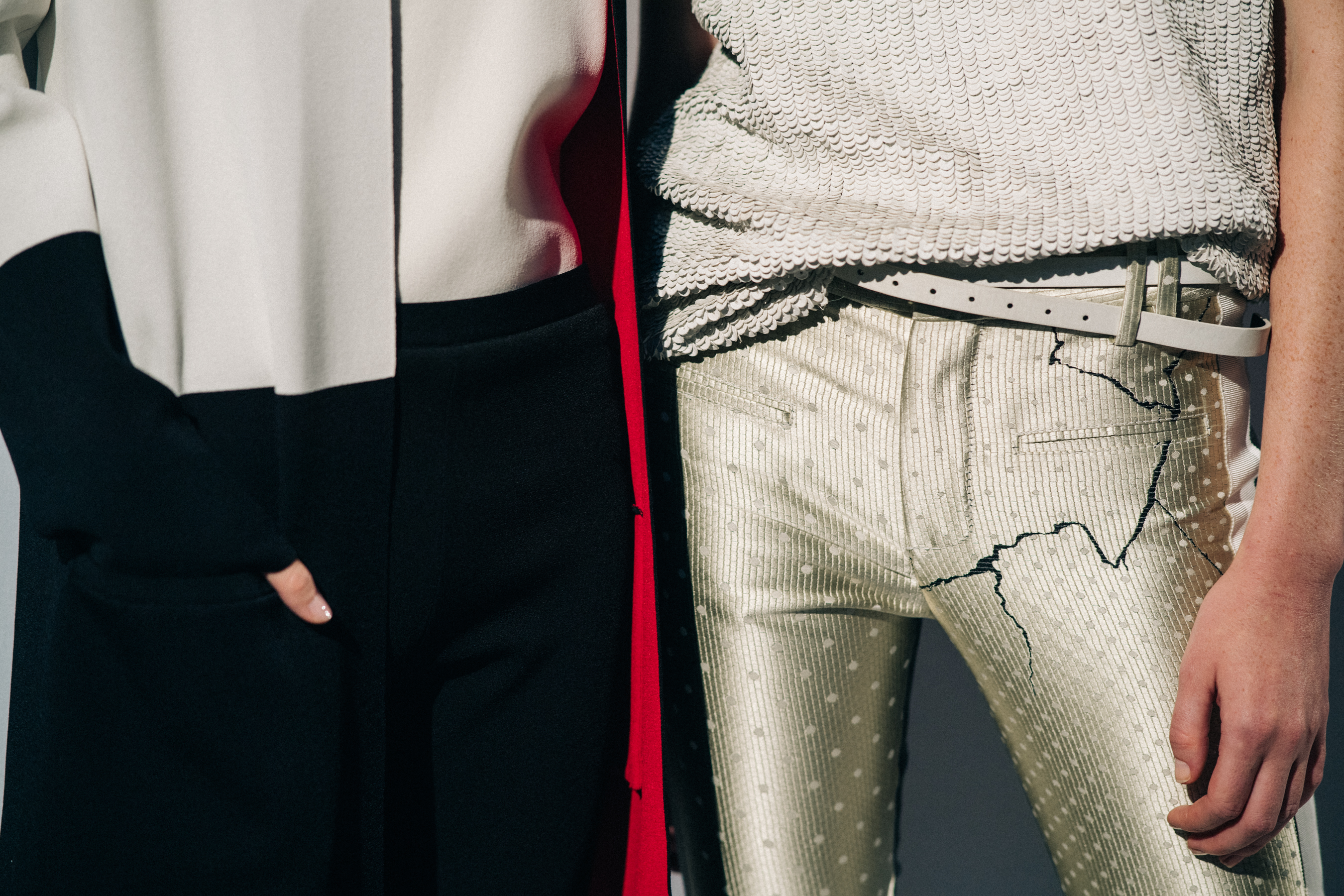 Model wearing white before a show