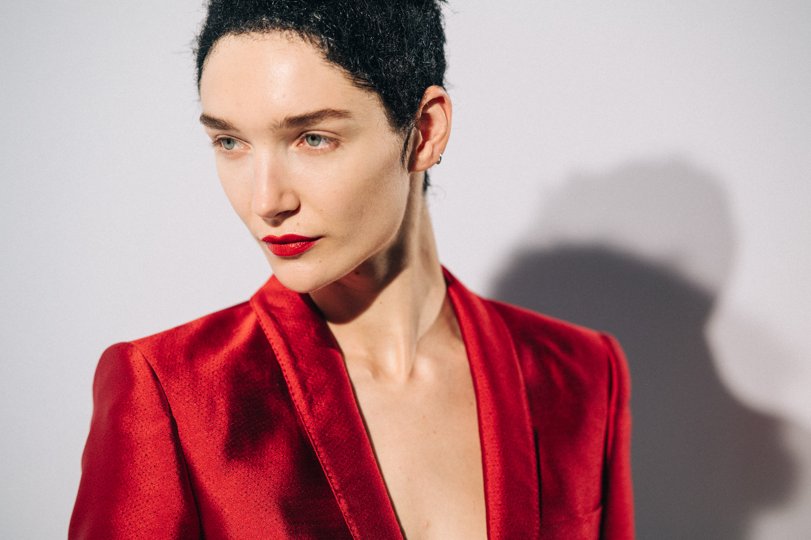 Model wearing red before a show