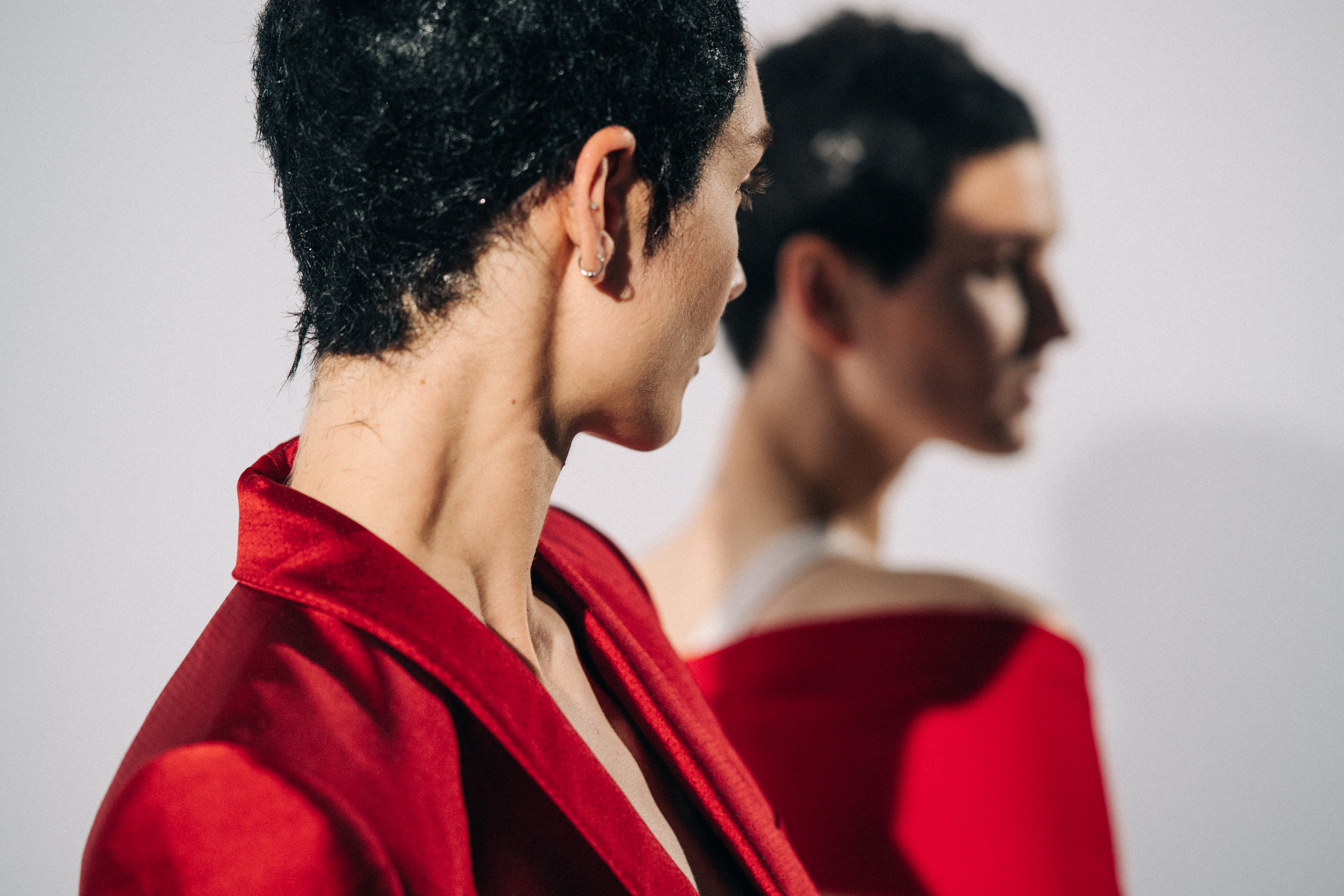 Model wearing red before a show