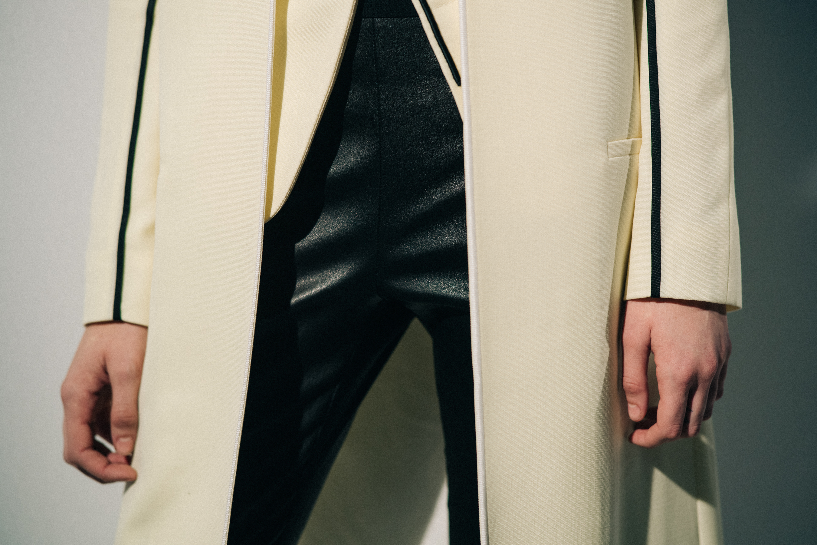 Model wearing white before a show