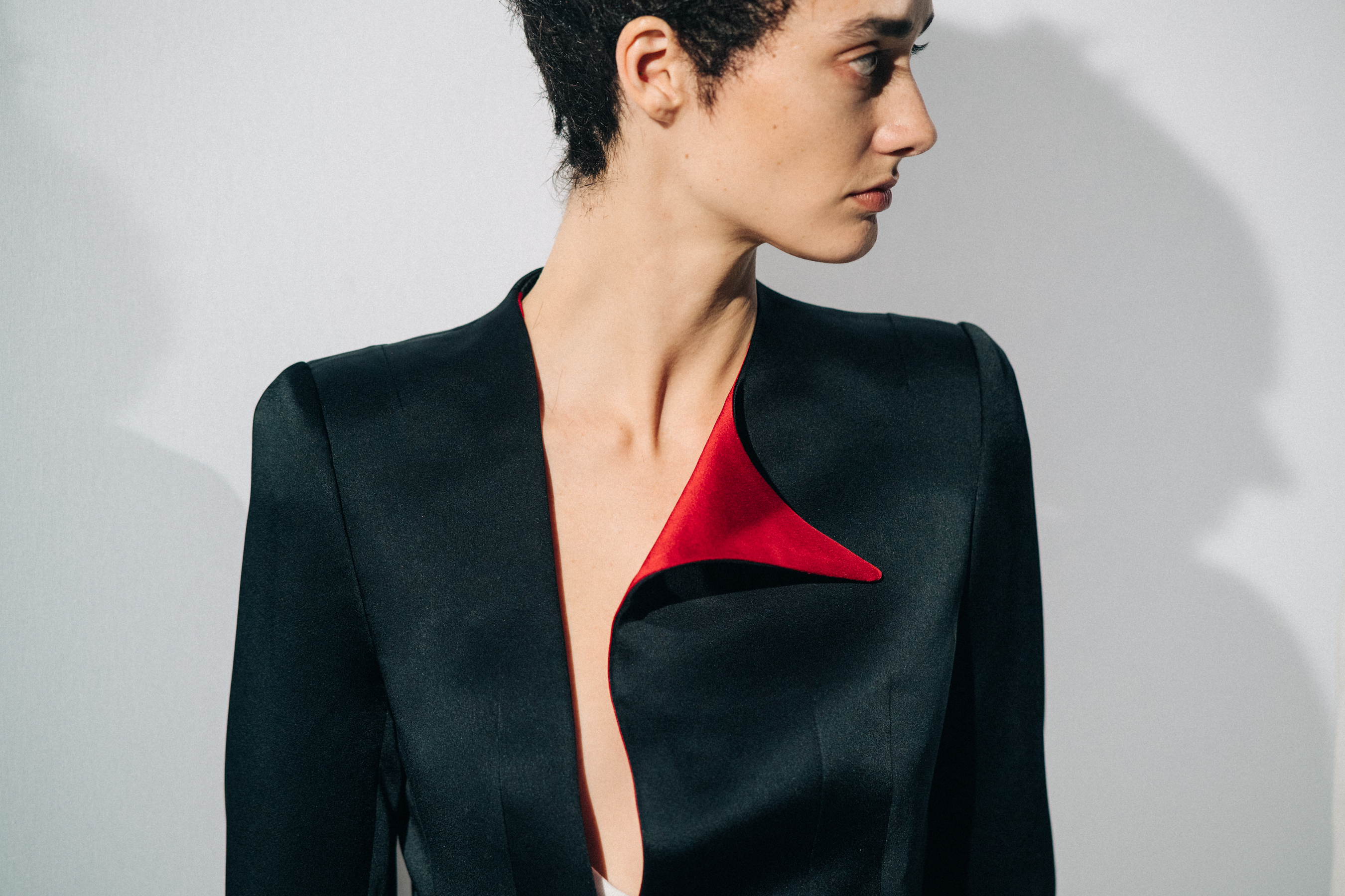 Model wearing black before a show