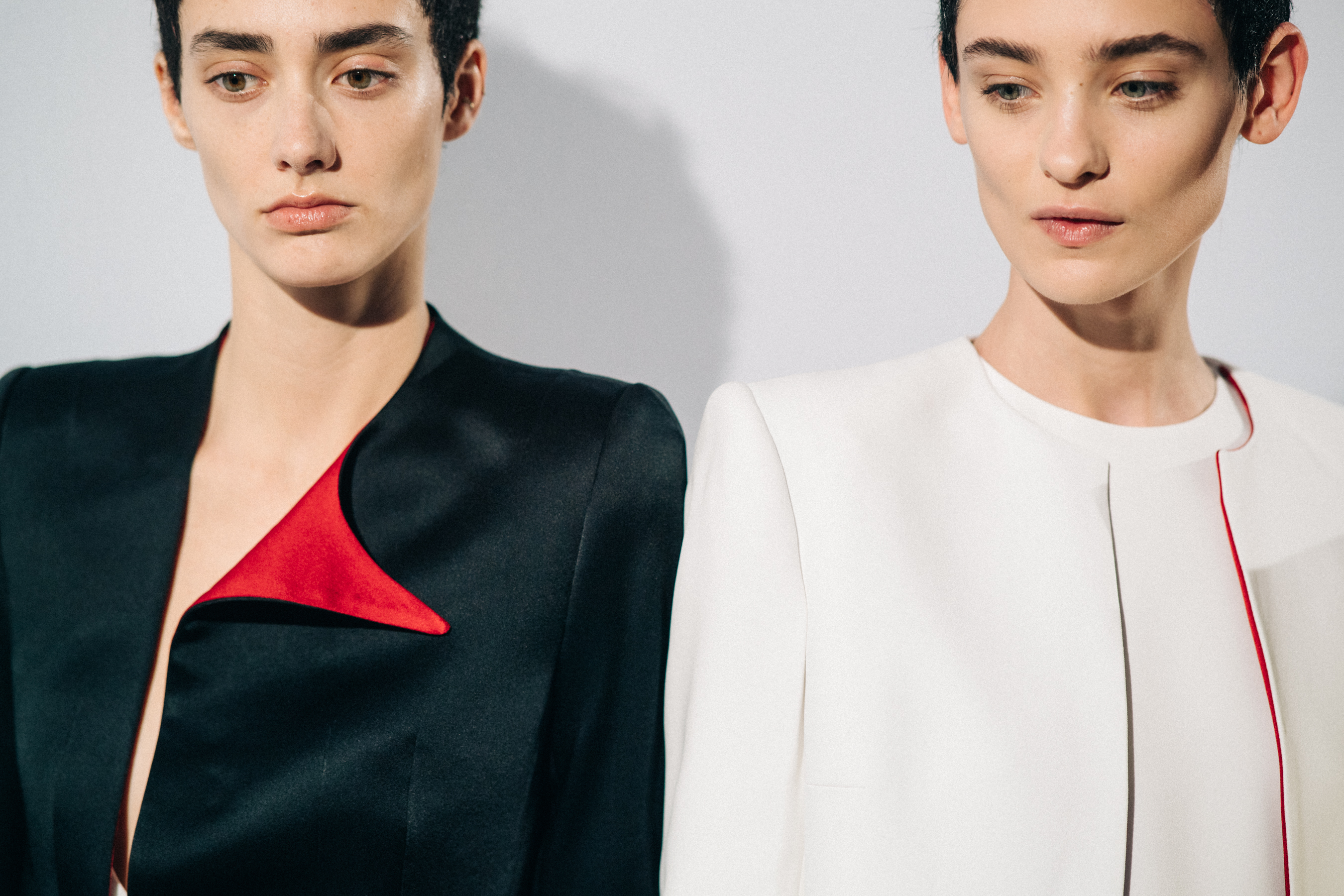 Model wearing black before a show