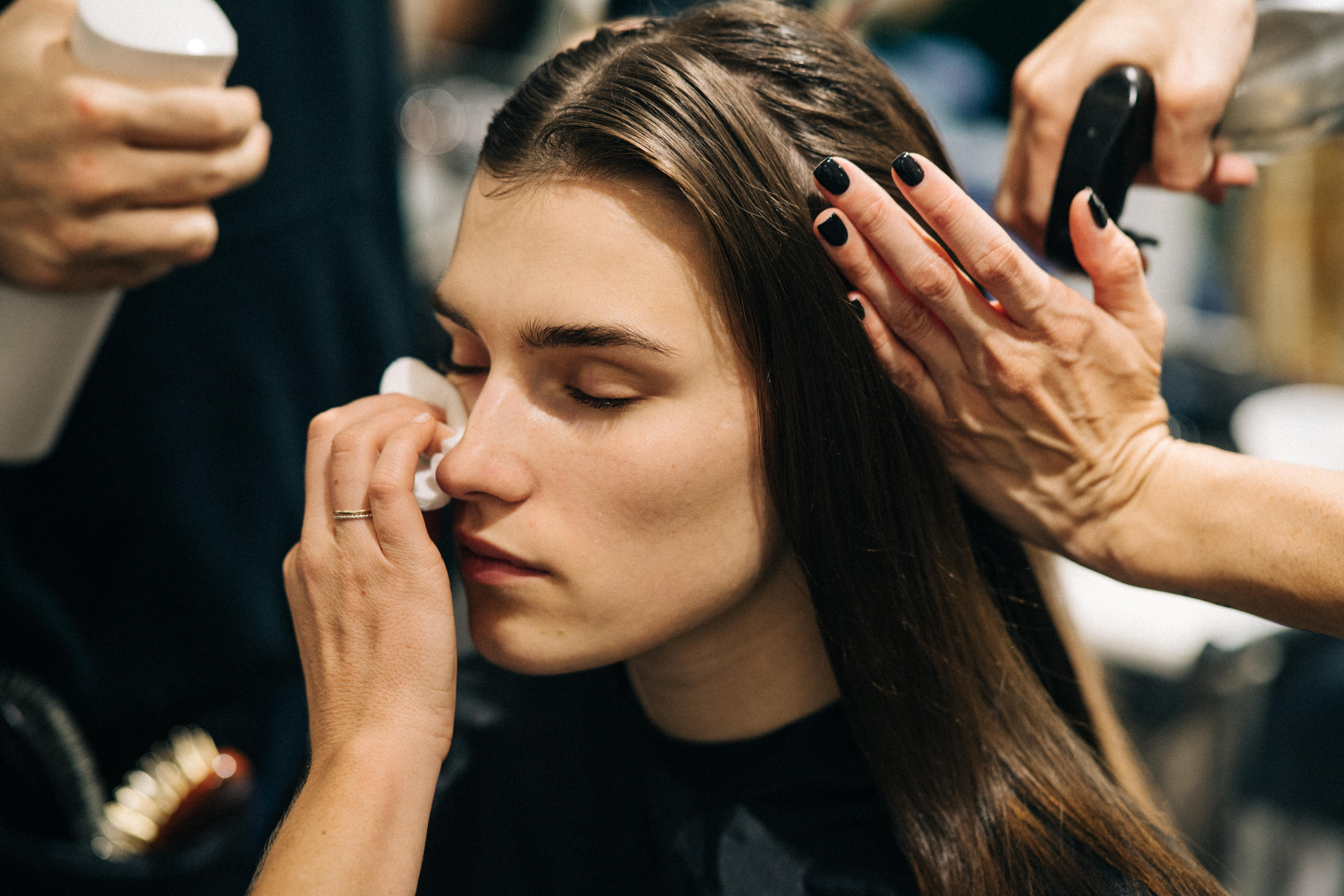 Model getting hair and make up done