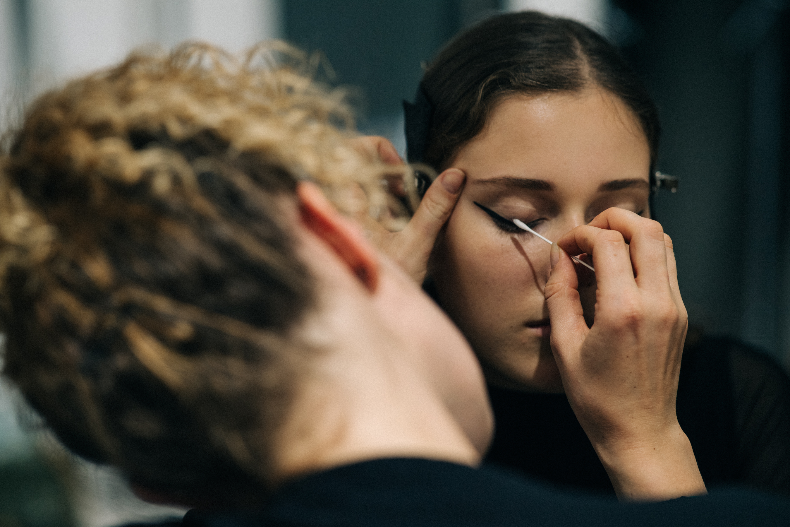 Model getting hair and make up done